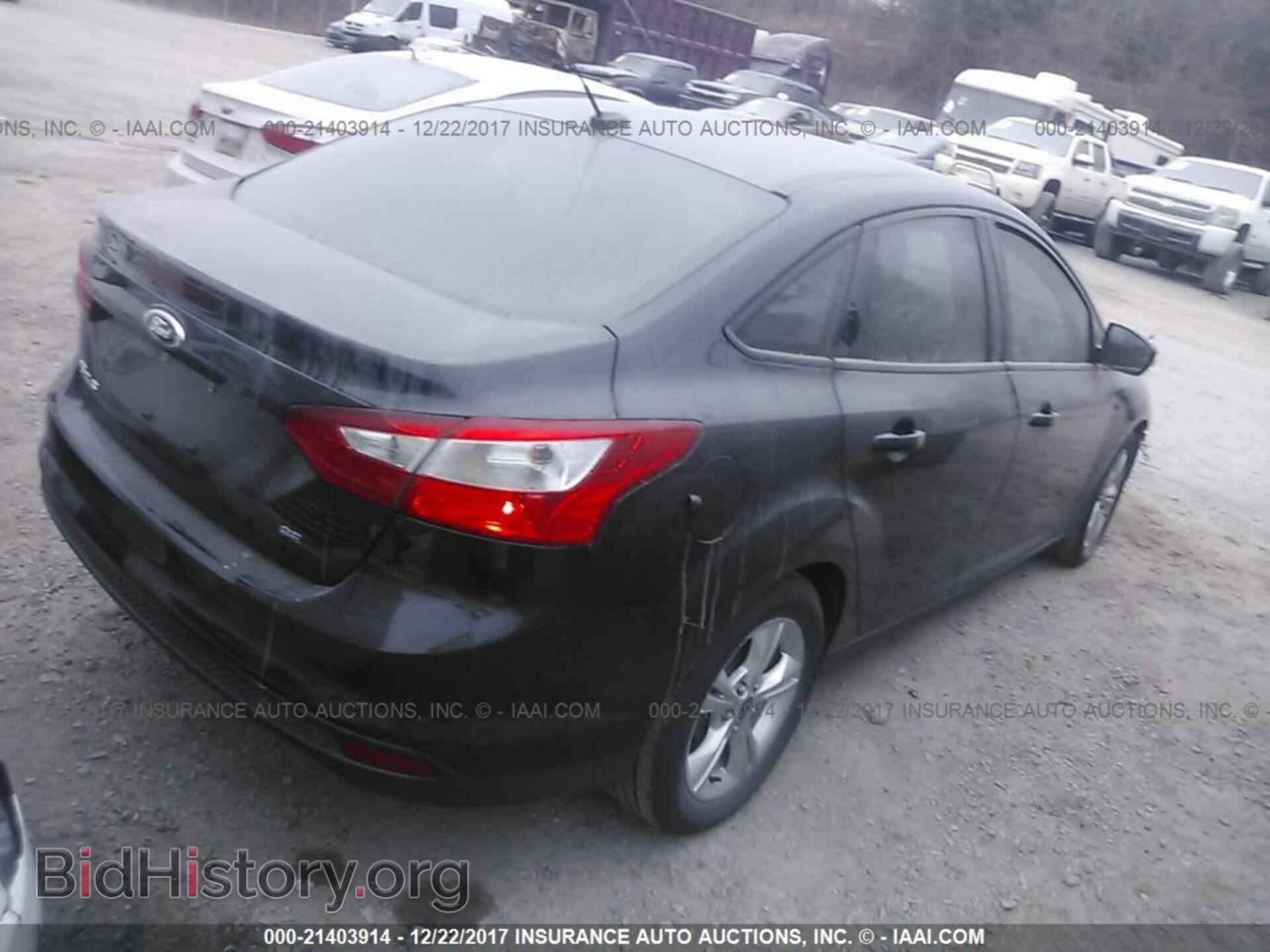 2013 Ford Focus - VIN: 1FADP3F20DL339889 - Photo 4