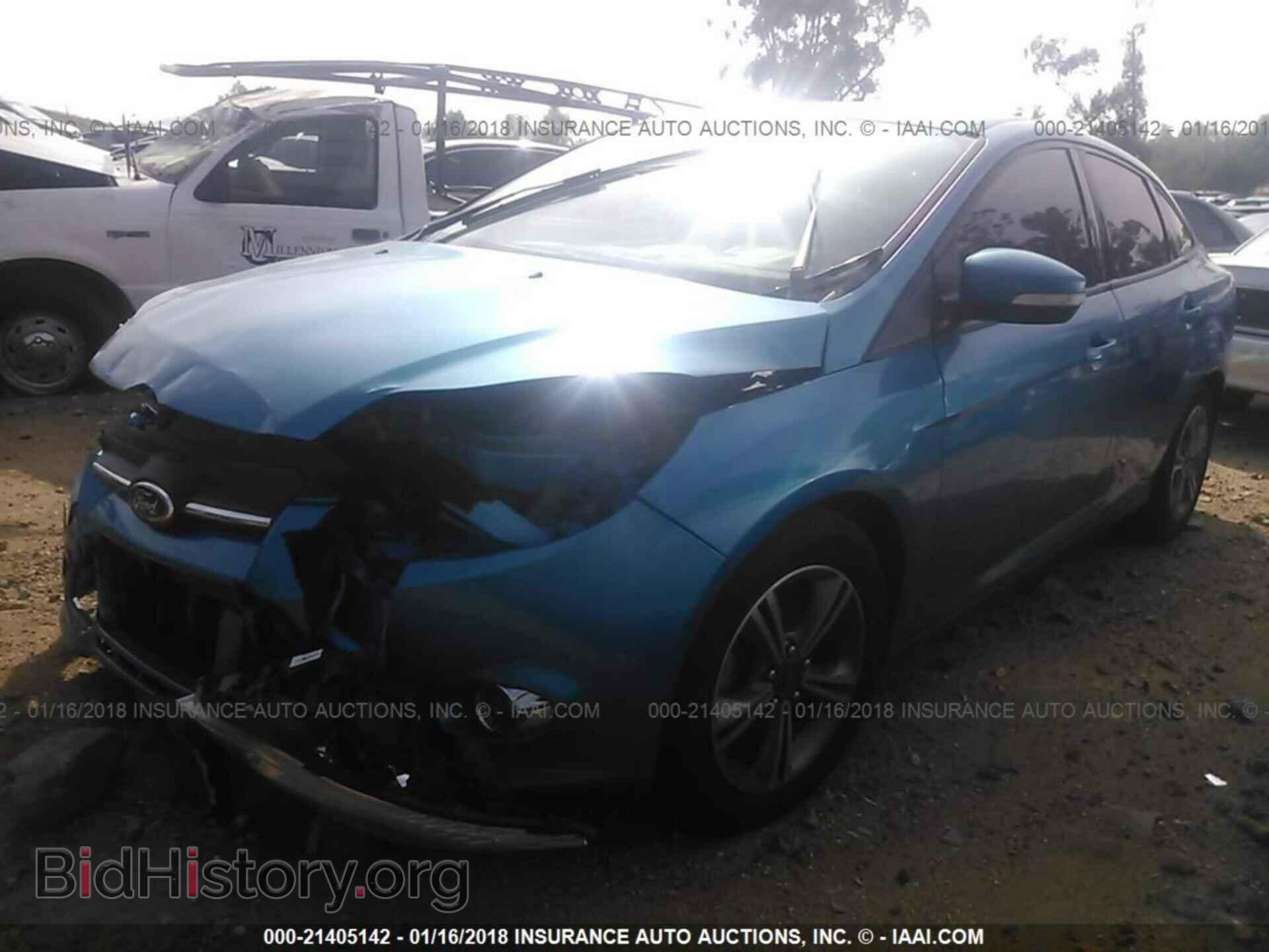 2014 Ford Focus - VIN: 1FADP3F21EL198560 - Фото 2