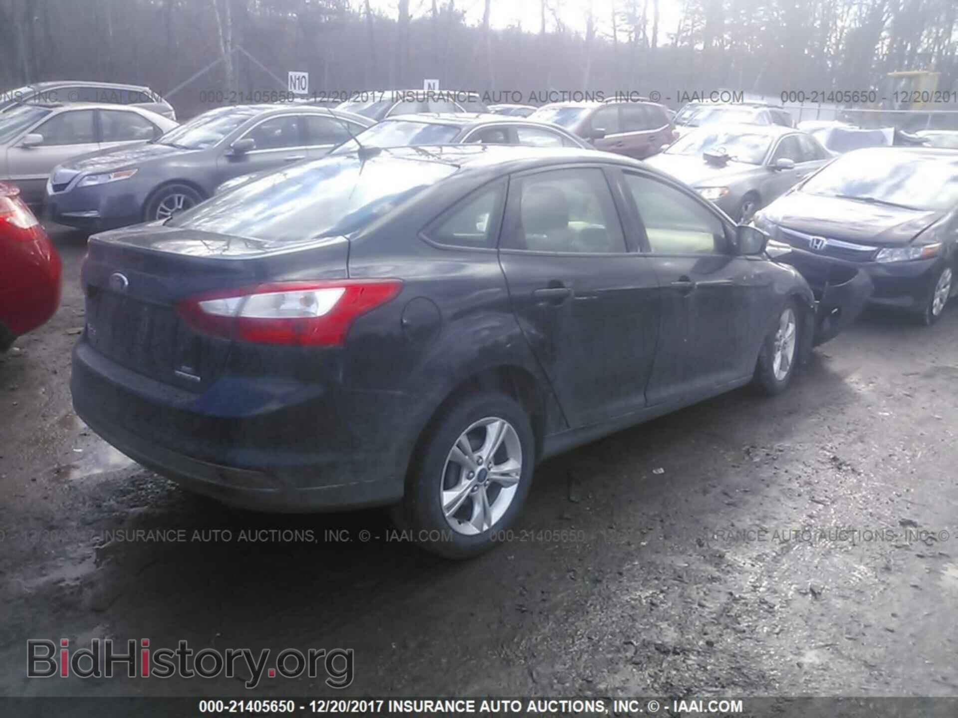 2014 Ford Focus - VIN: 1FADP3F25EL260655 - Photo 4