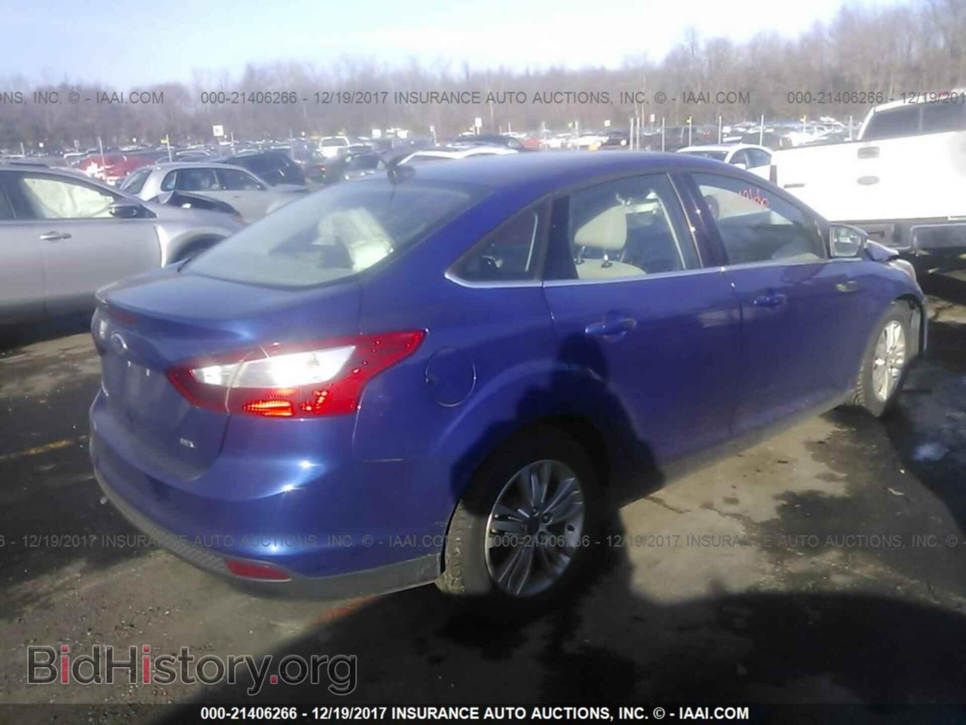 2012 Ford Focus - VIN: 1FAHP3H24CL275921 - Photo 4