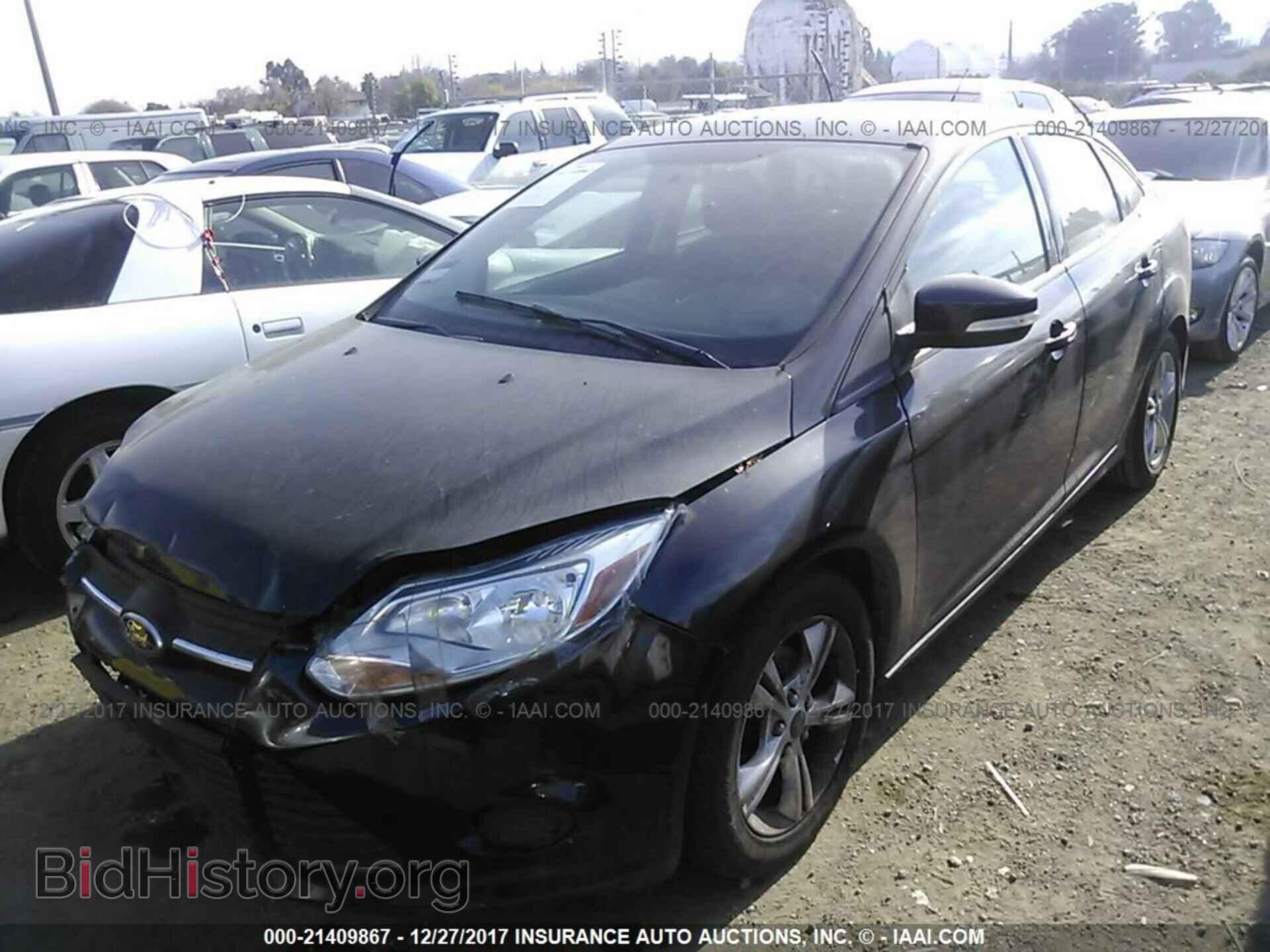 2014 Ford Focus - VIN: 1FADP3F21EL211162 - Photo 2