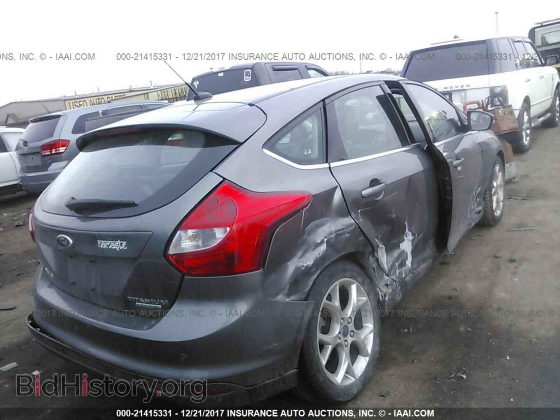 2014 Ford Focus - VIN: 1FADP3N20EL342164 - Photo 4
