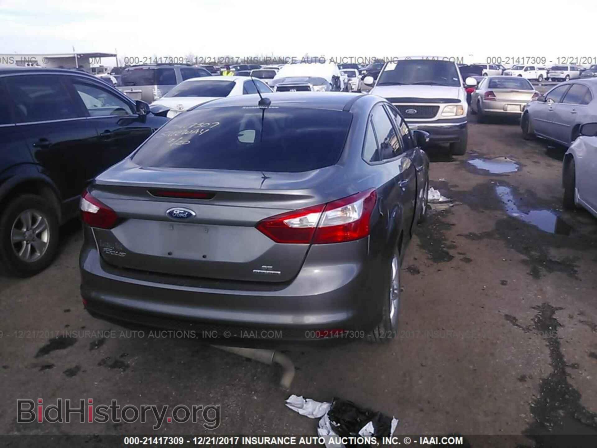 2014 Ford Focus - VIN: 1FADP3F20EL196525 - Photo 4