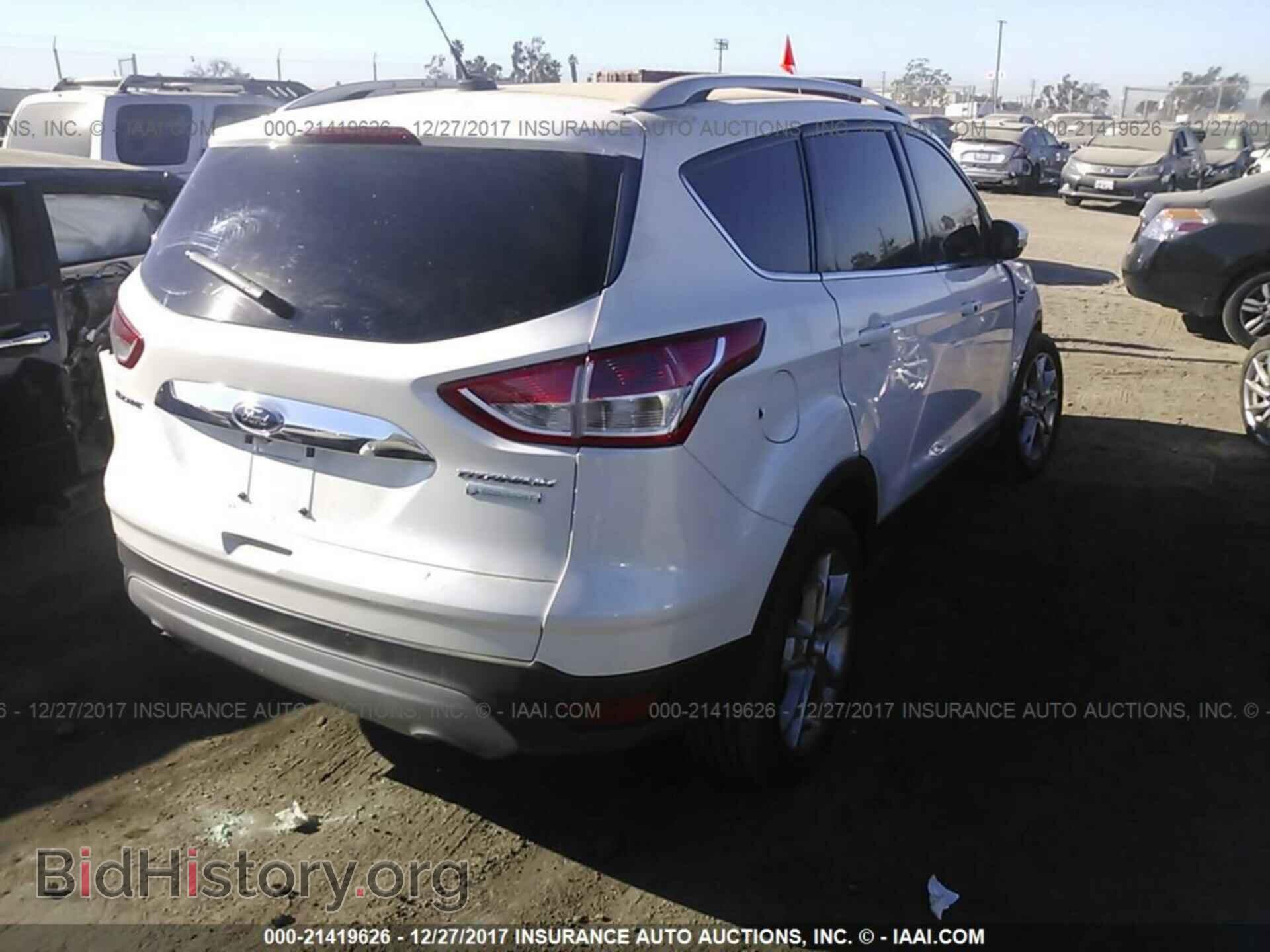 2014 Ford Escape - VIN: 1FMCU0J94EUB63809 - Фото 4