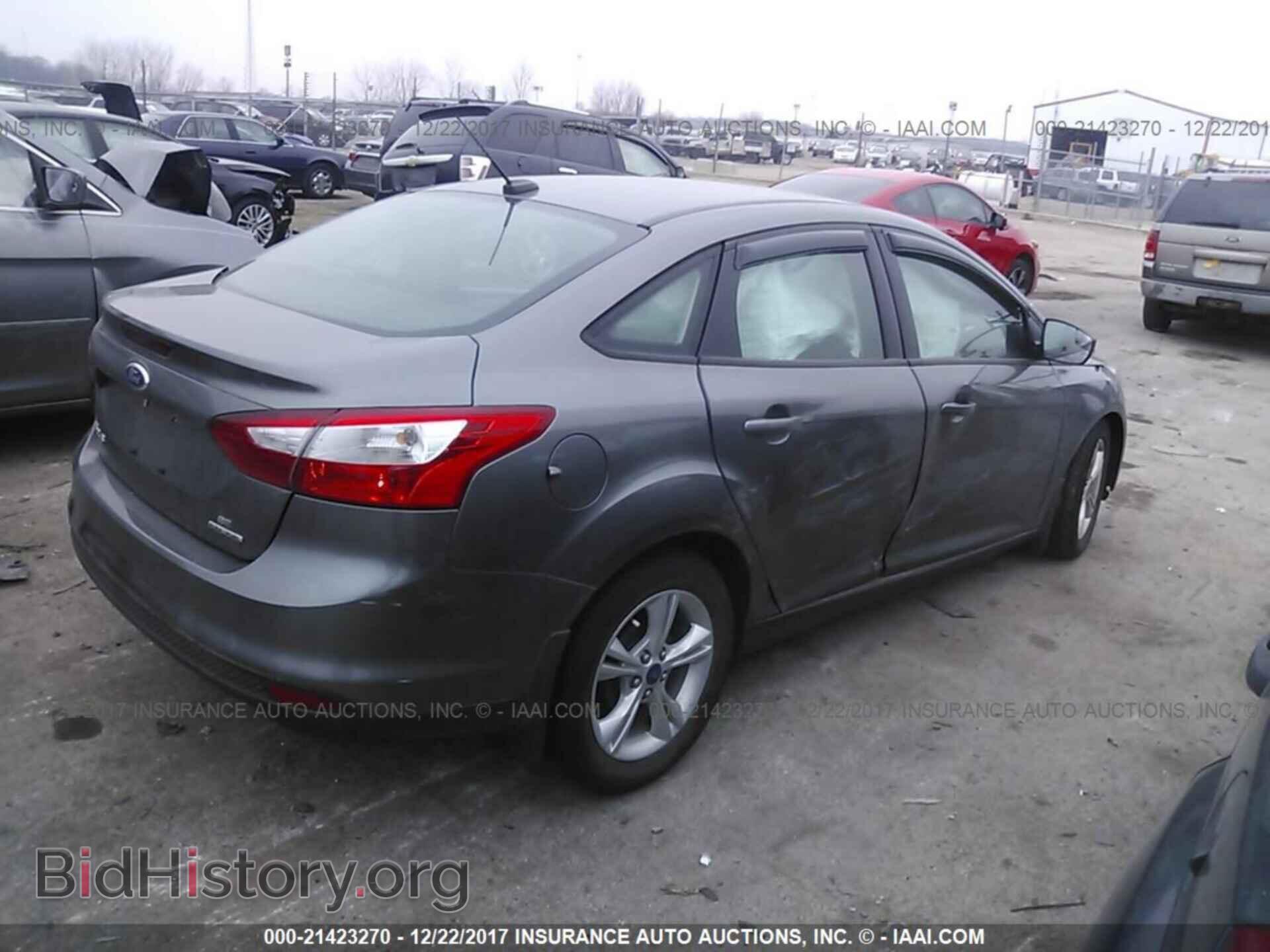 2014 Ford Focus - VIN: 1FADP3F21EL121963 - Фото 4