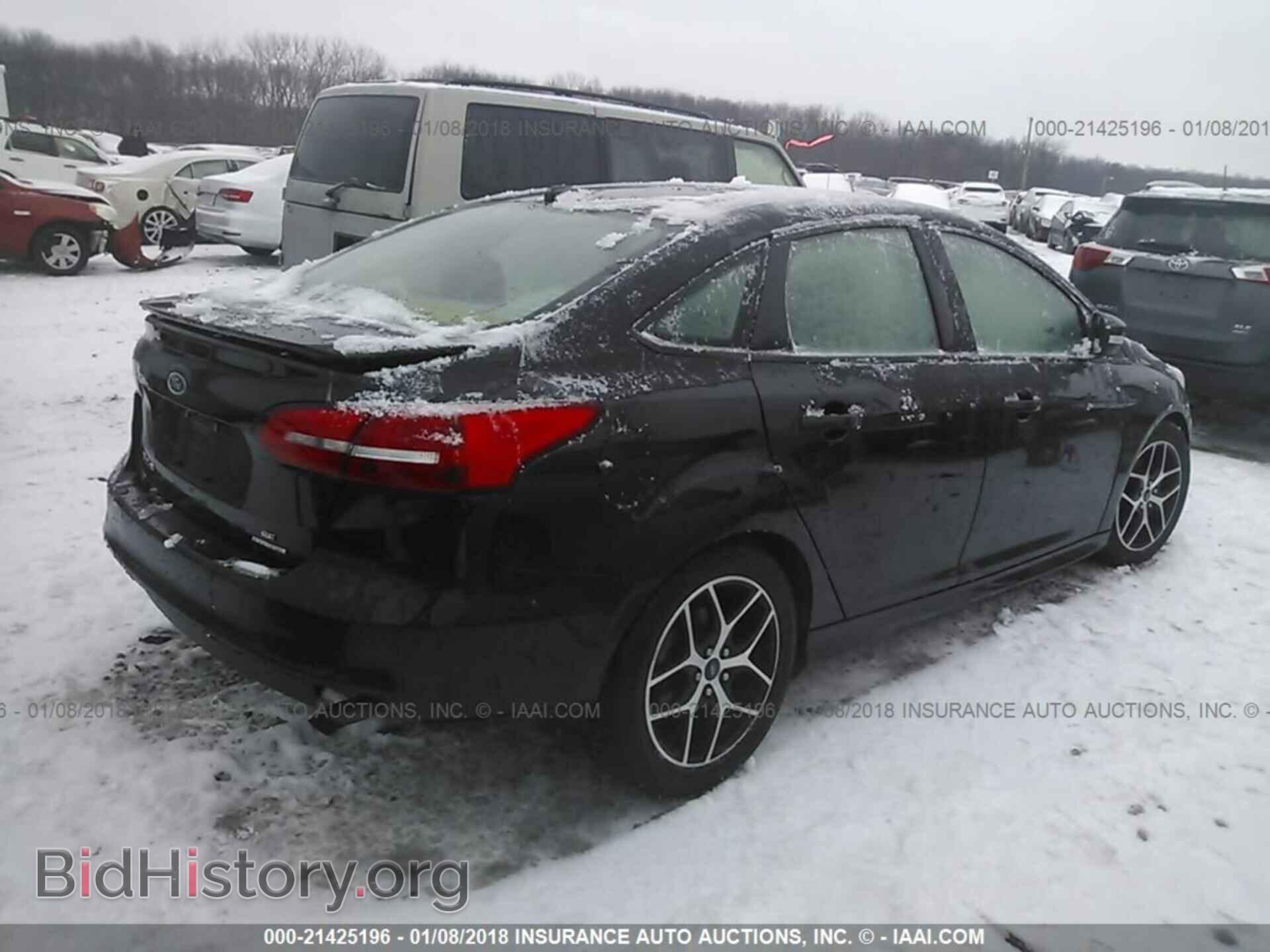 2015 Ford Focus - VIN: 1FADP3F24FL378987 - Photo 4
