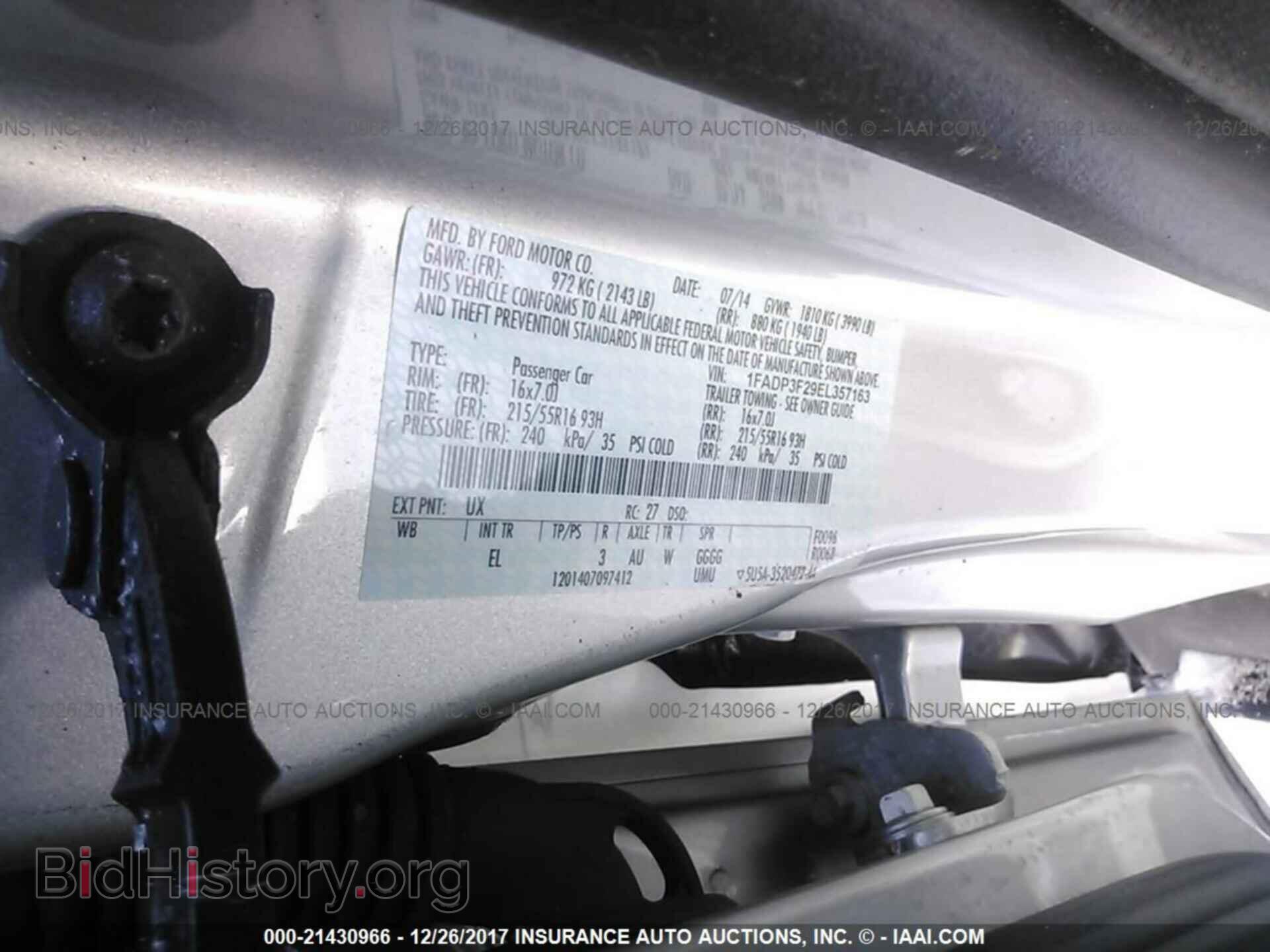 2014 Ford Focus - VIN: 1FADP3F29EL357163 - Фото 9