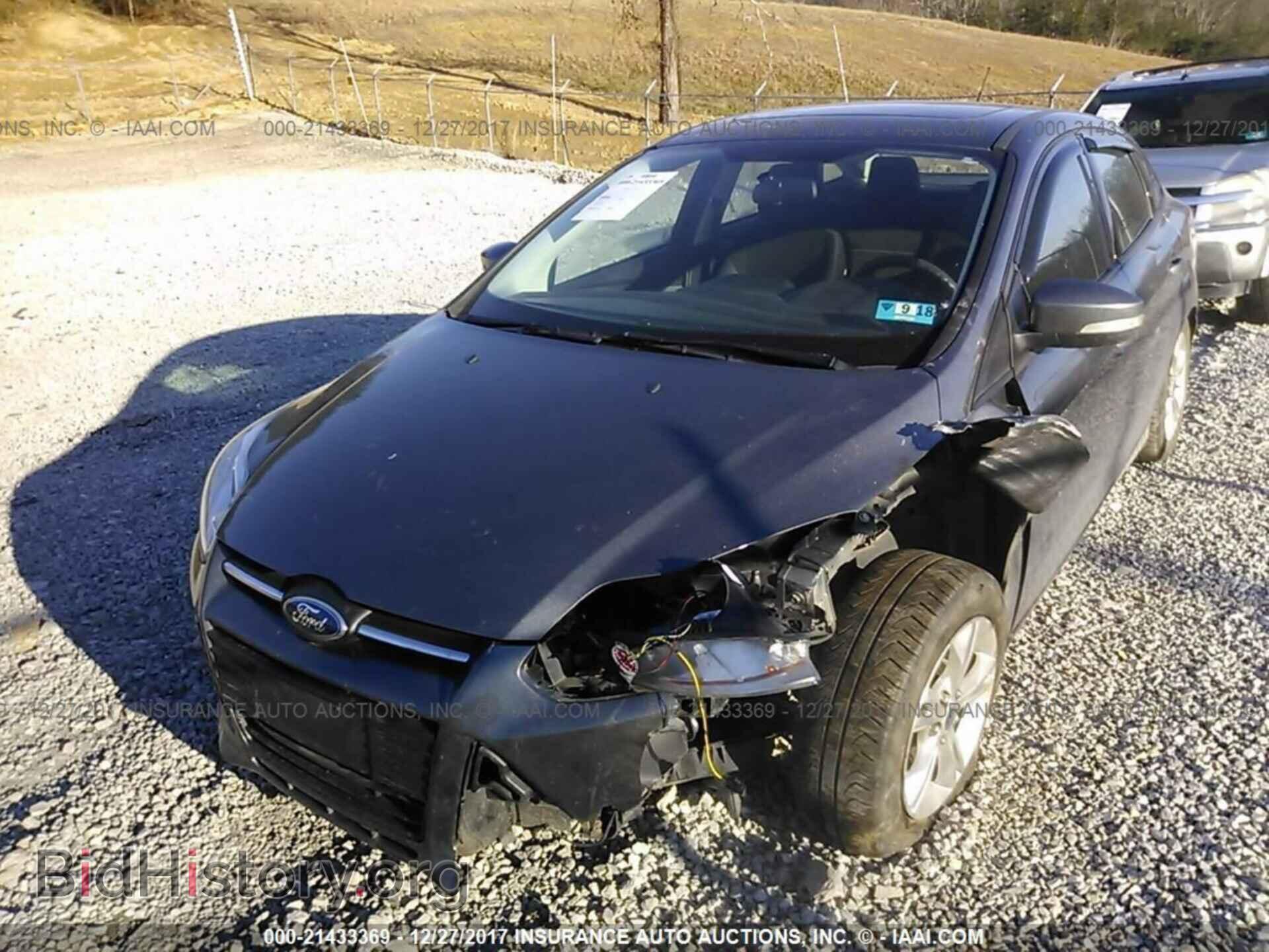 2014 Ford Focus - VIN: 1FADP3F28EL106876 - Фото 2