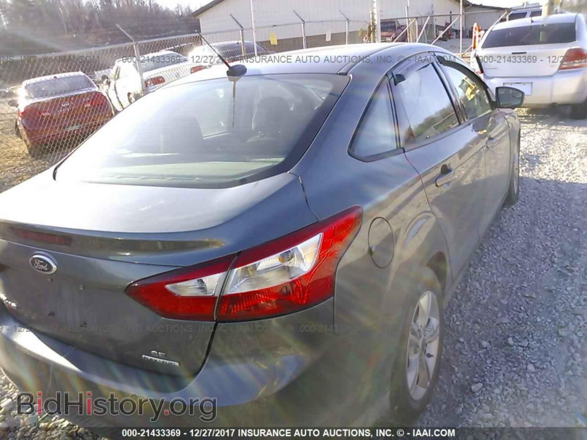 2014 Ford Focus - VIN: 1FADP3F28EL106876 - Фото 4