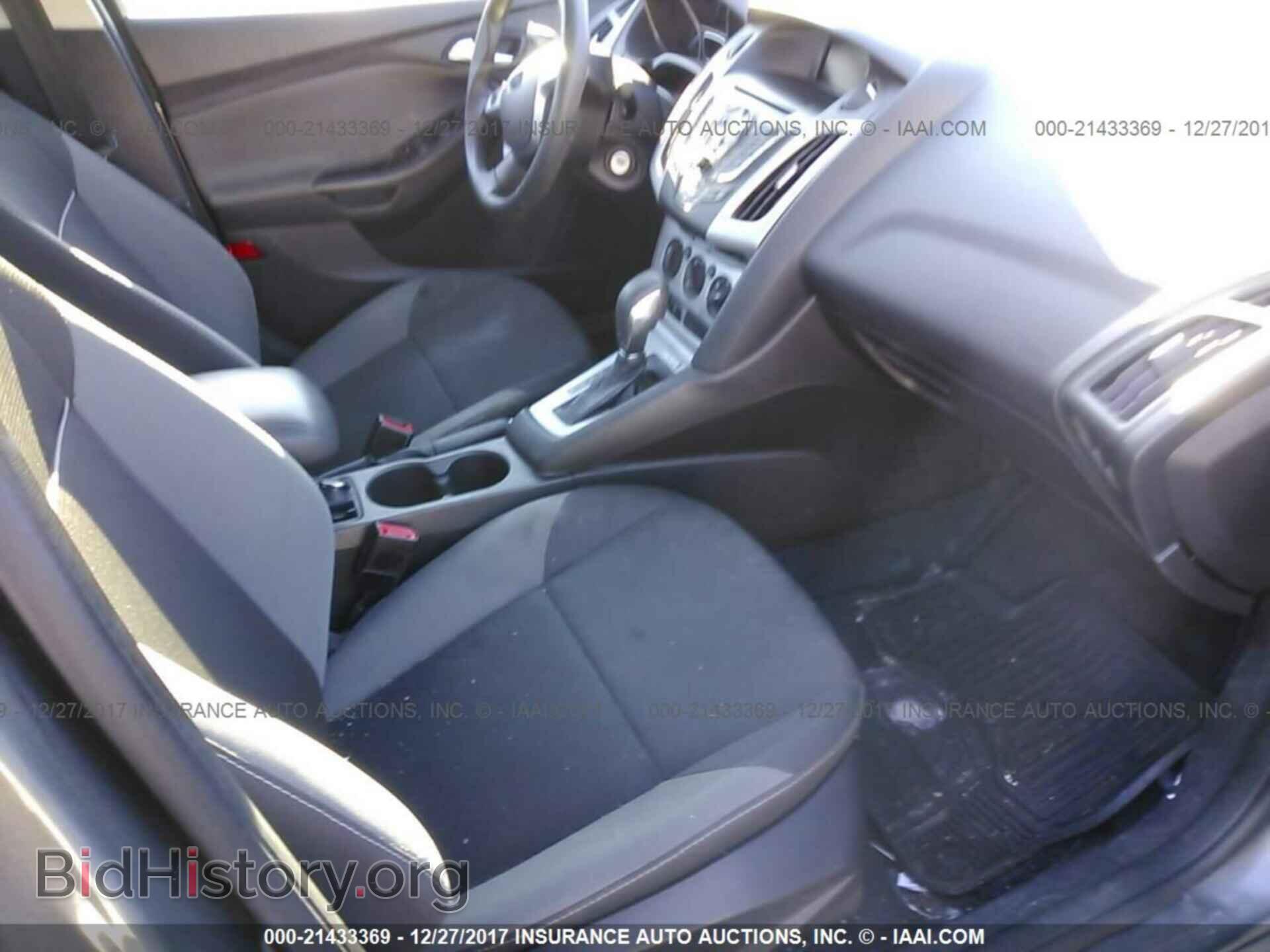 2014 Ford Focus - VIN: 1FADP3F28EL106876 - Фото 5