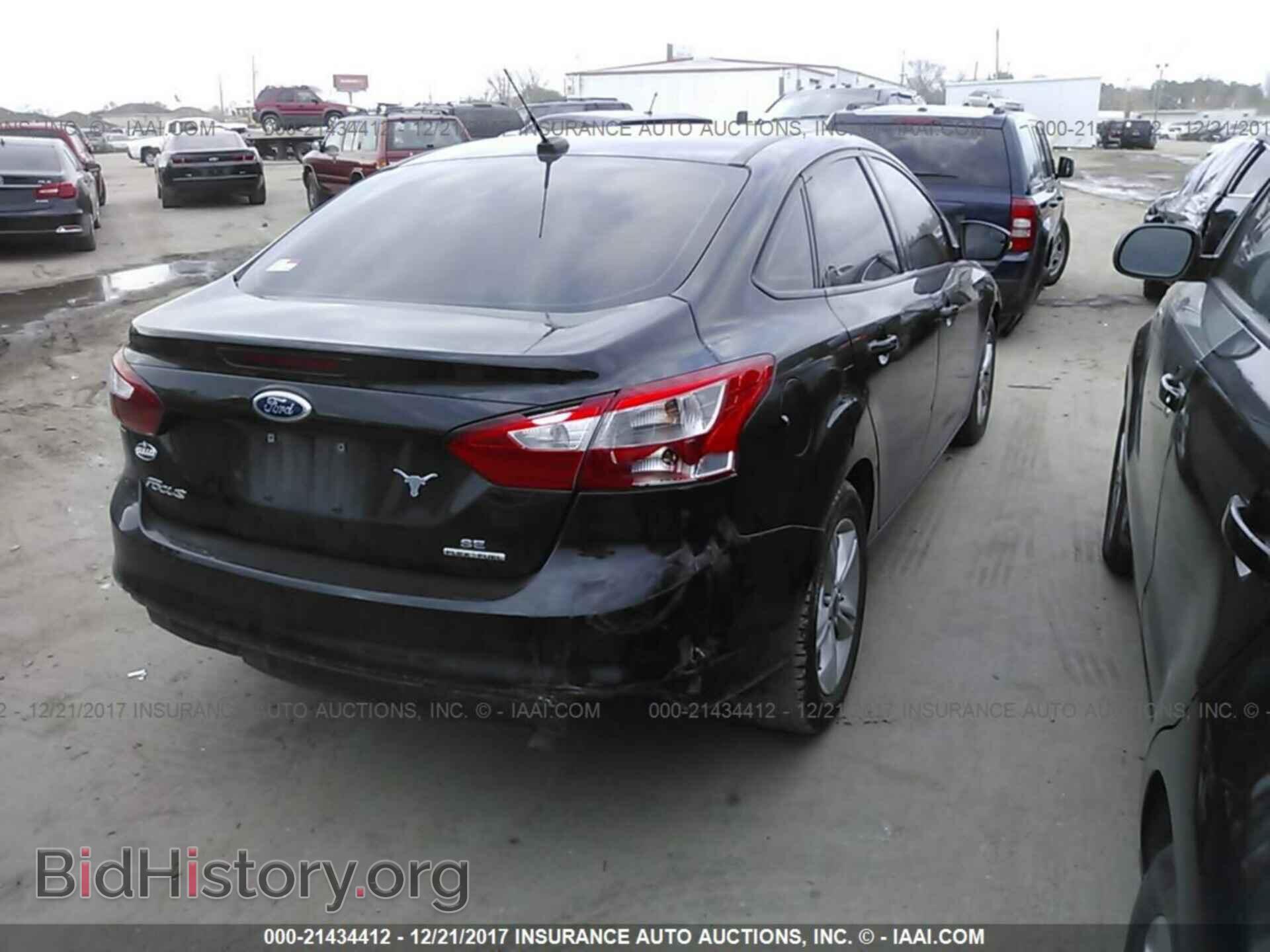 2014 Ford Focus - VIN: 1FADP3F2XEL440200 - Photo 4