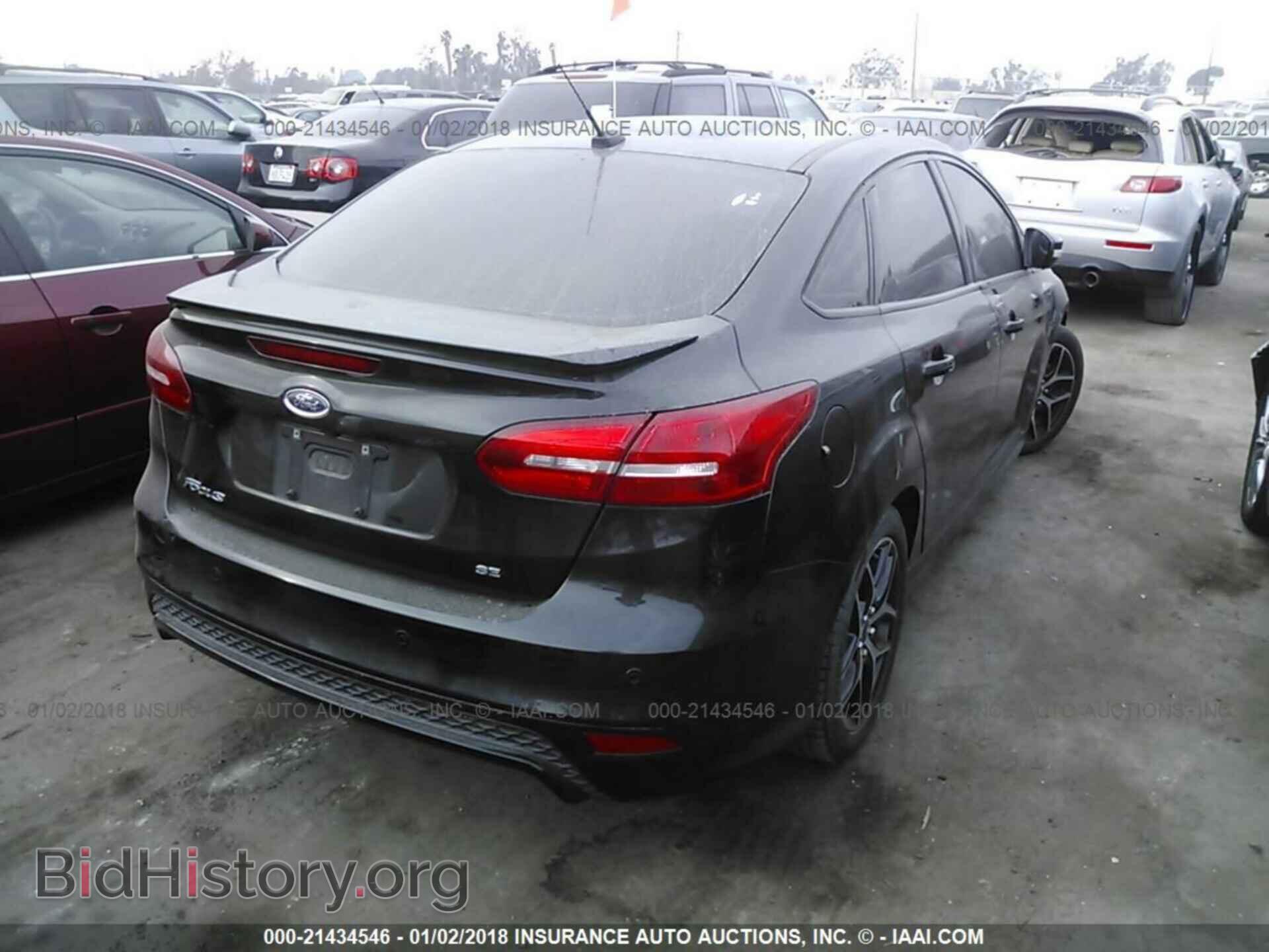 2015 Ford Focus - VIN: 1FADP3F21FL221336 - Photo 4