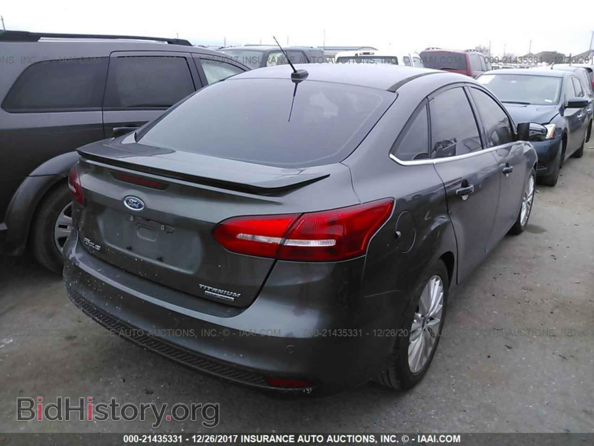 2015 Ford Focus - VIN: 1FADP3J28FL363433 - Photo 4