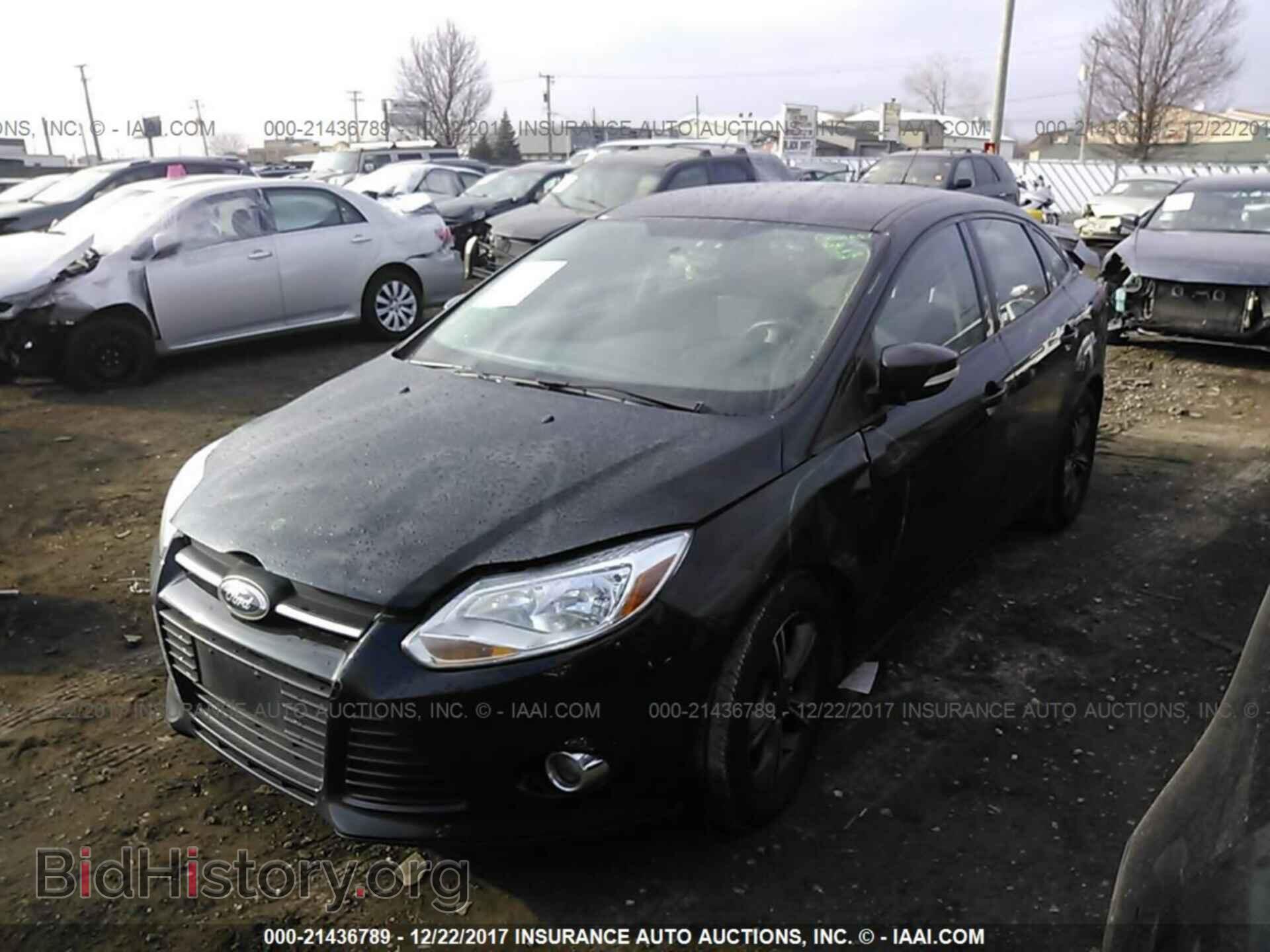2014 Ford Focus - VIN: 1FADP3F26EL258932 - Photo 2