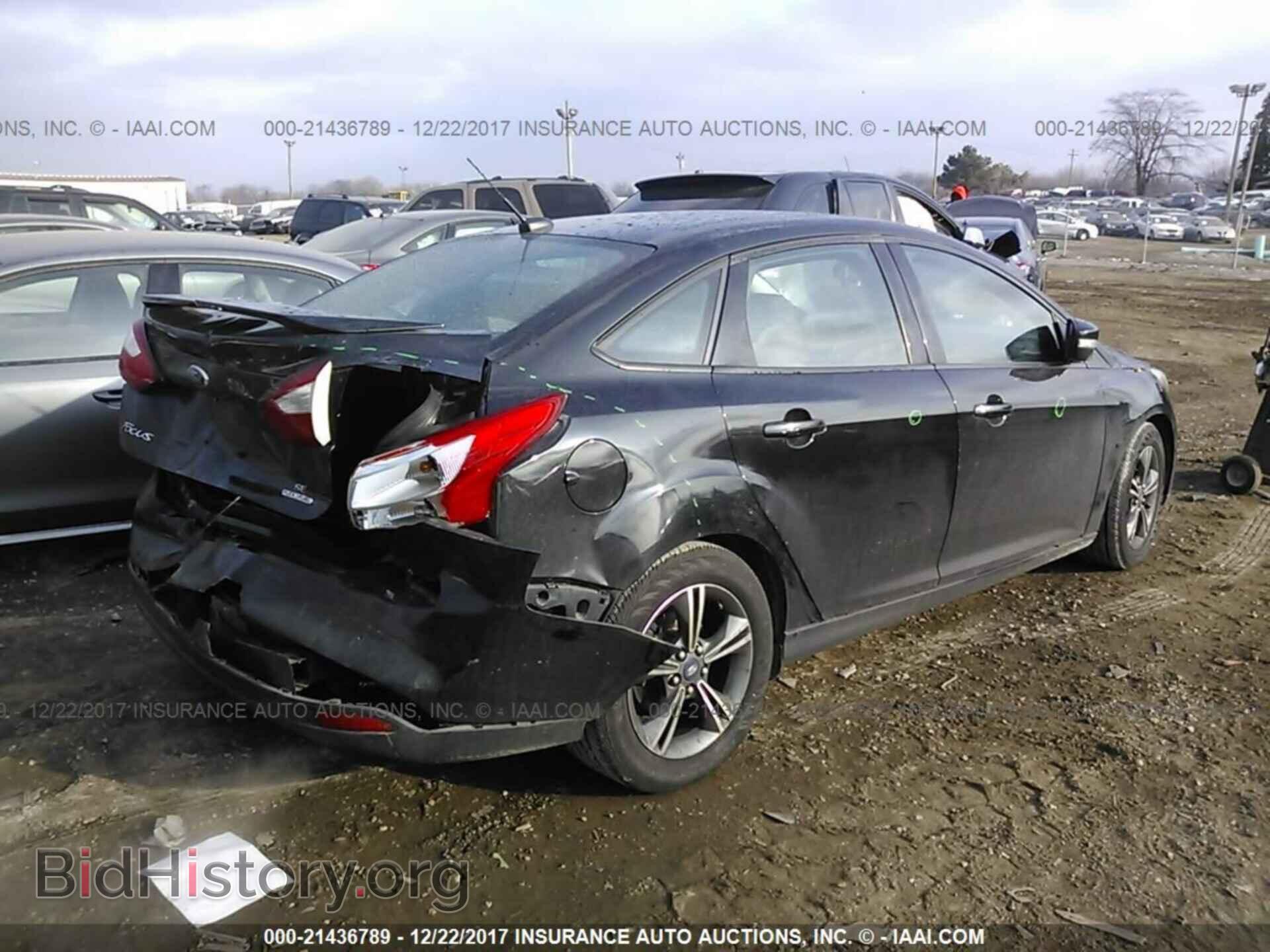 2014 Ford Focus - VIN: 1FADP3F26EL258932 - Photo 4
