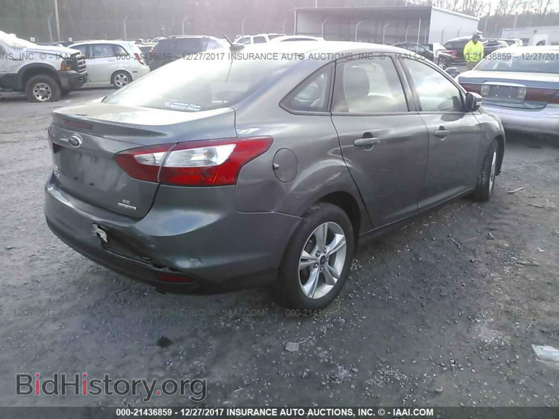 2014 Ford Focus - VIN: 1FADP3F25EL390757 - Photo 4