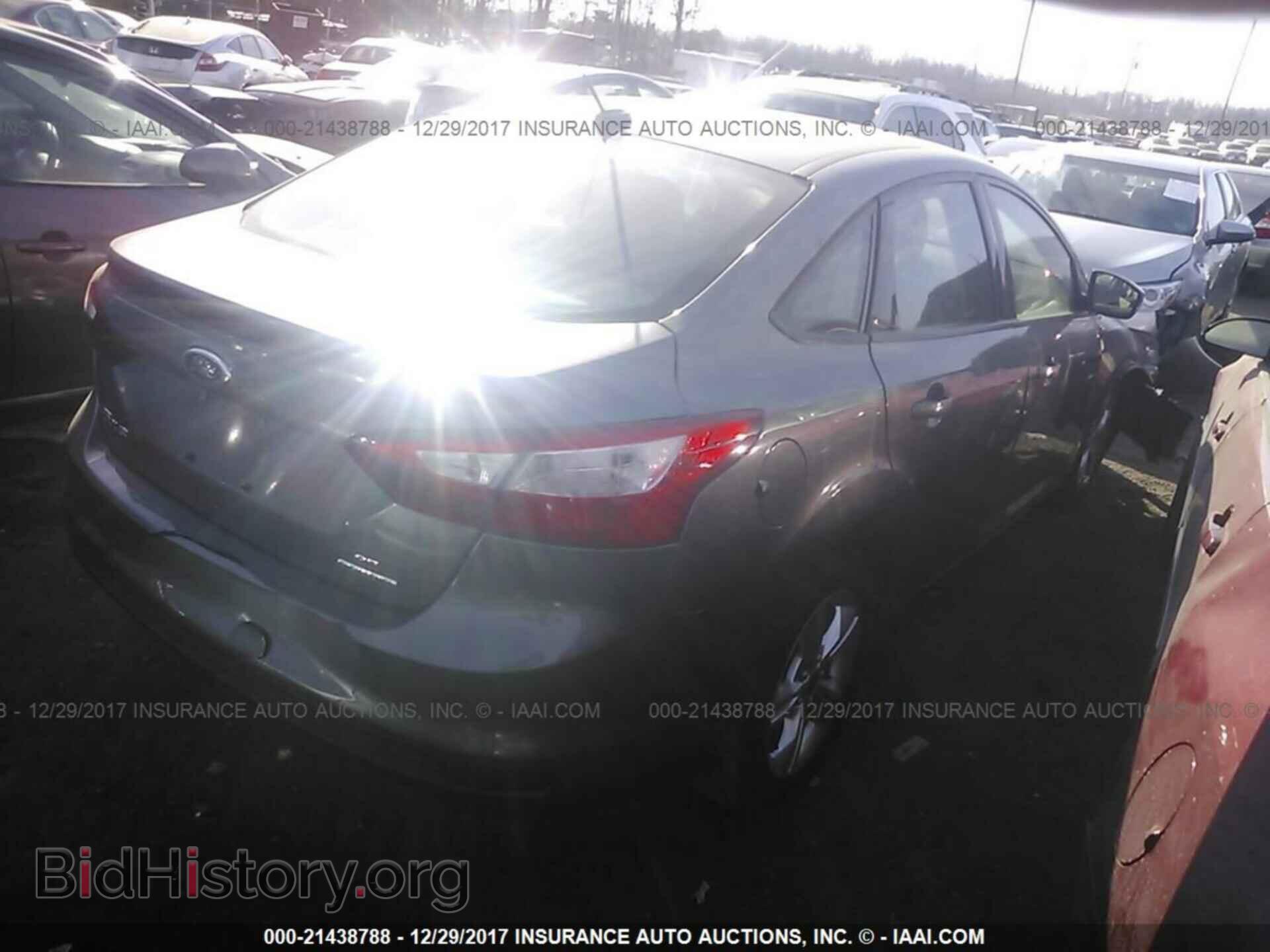 2014 Ford Focus - VIN: 1FADP3F28EL245244 - Photo 4