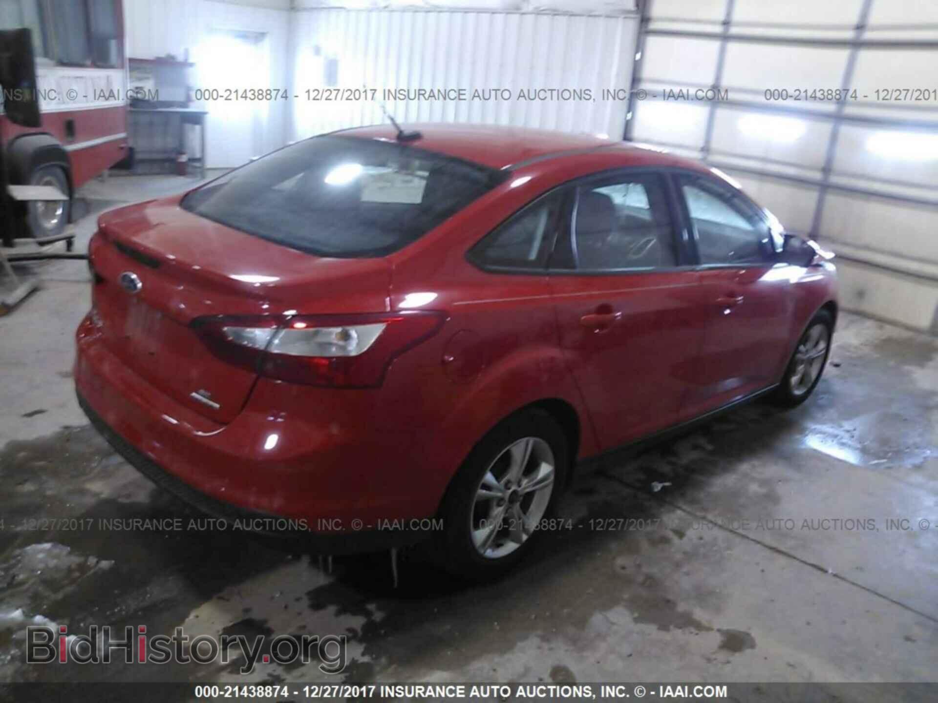 2014 Ford Focus - VIN: 1FADP3F20EL323502 - Photo 4