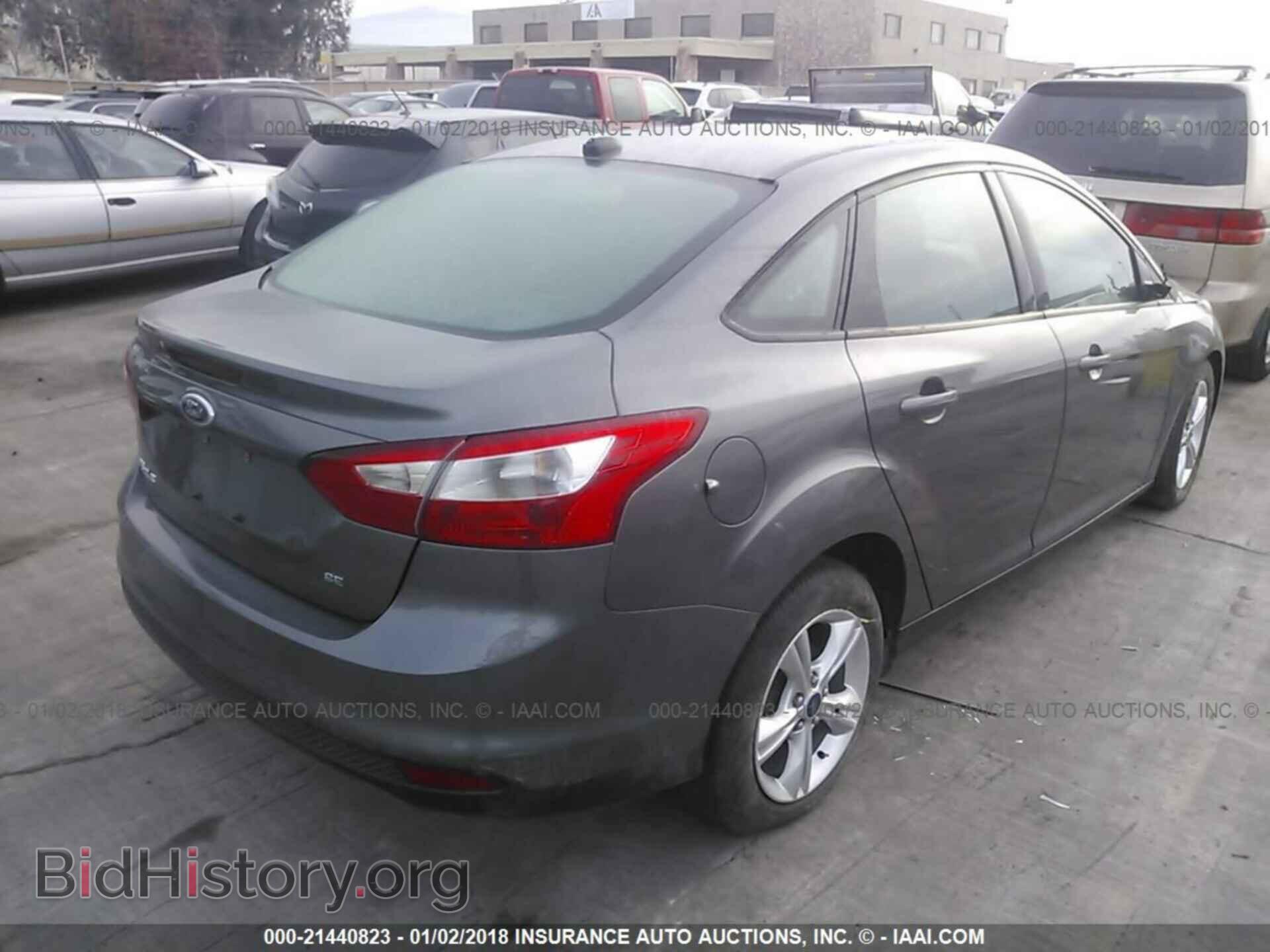 2014 Ford Focus - VIN: 1FADP3F2XEL363828 - Photo 4