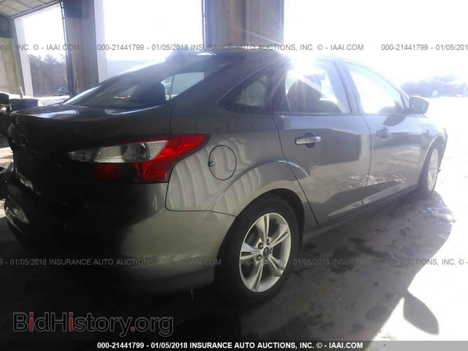 2014 Ford Focus - VIN: 1FADP3F21EL172671 - Фото 4