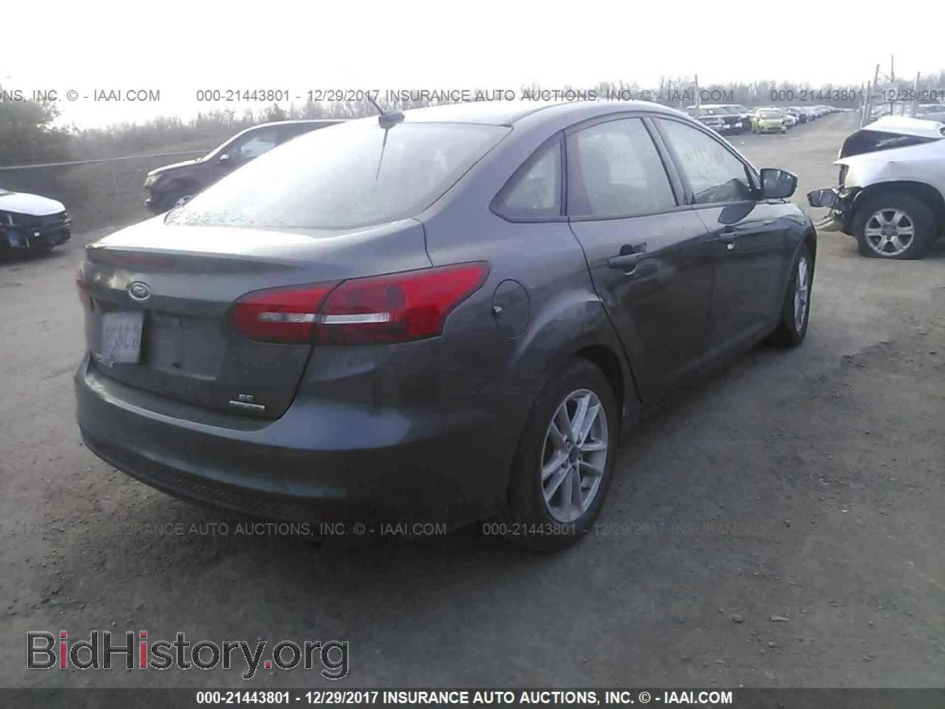 2016 Ford Focus - VIN: 1FADP3F21GL384389 - Photo 4