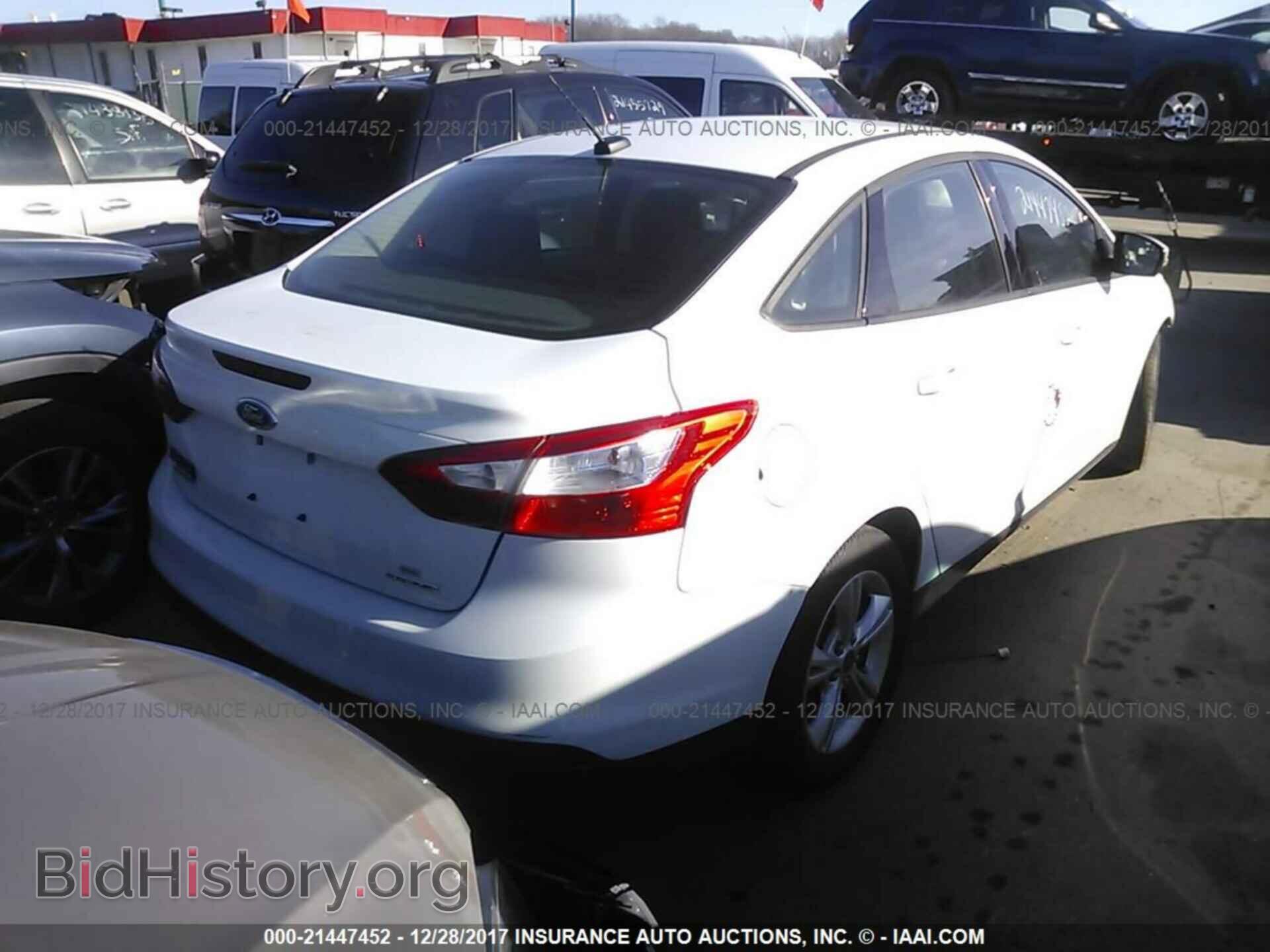 2013 Ford Focus - VIN: 1FADP3F27DL318635 - Фото 4