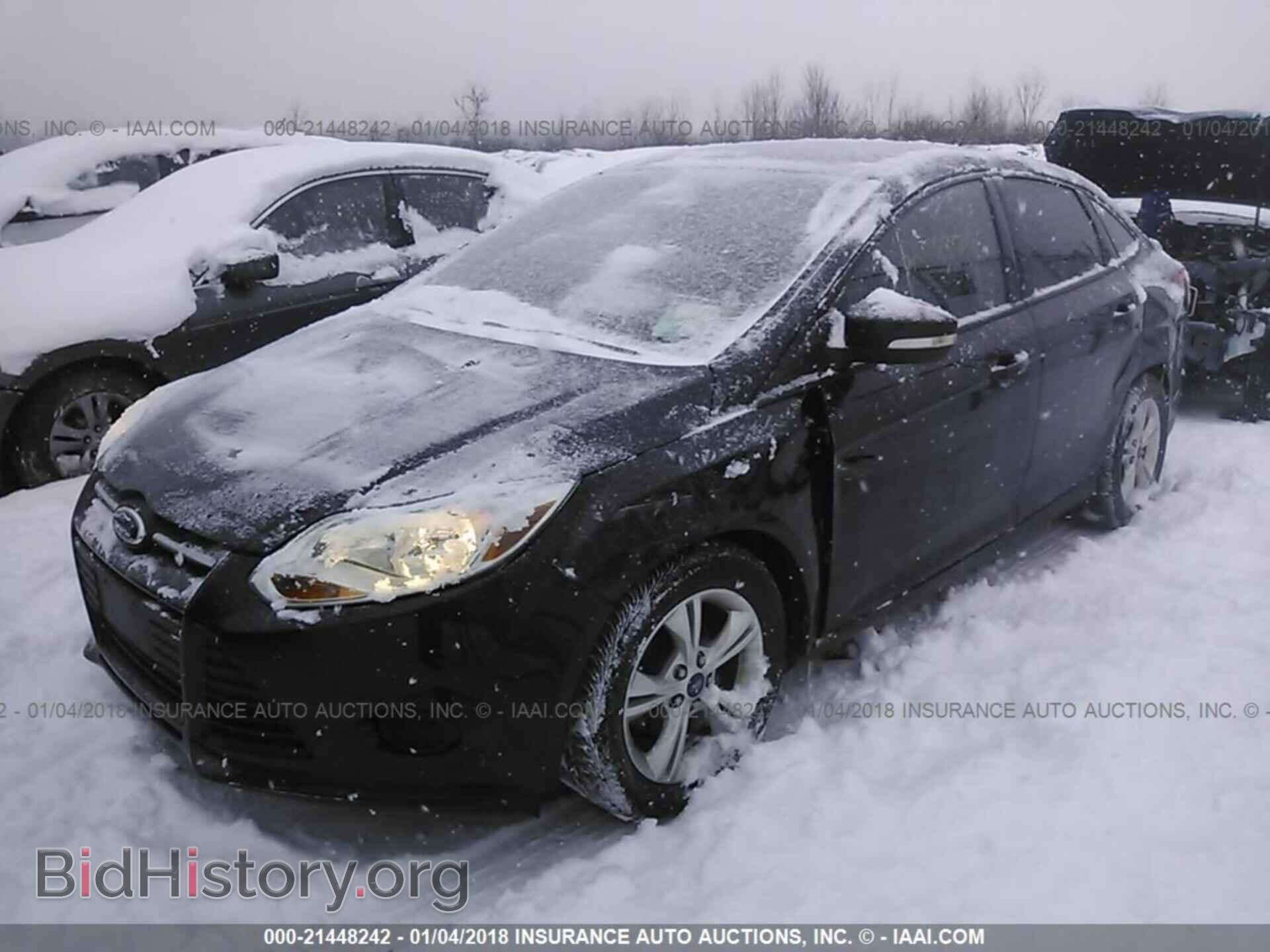 2013 Ford Focus - VIN: 1FADP3F29DL258633 - Photo 2