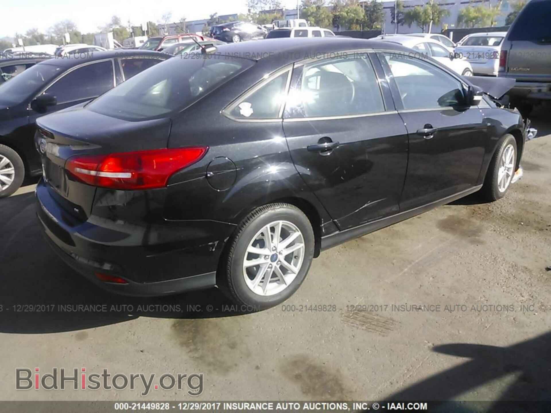 2015 Ford Focus - VIN: 1FADP3F25FL324548 - Photo 4