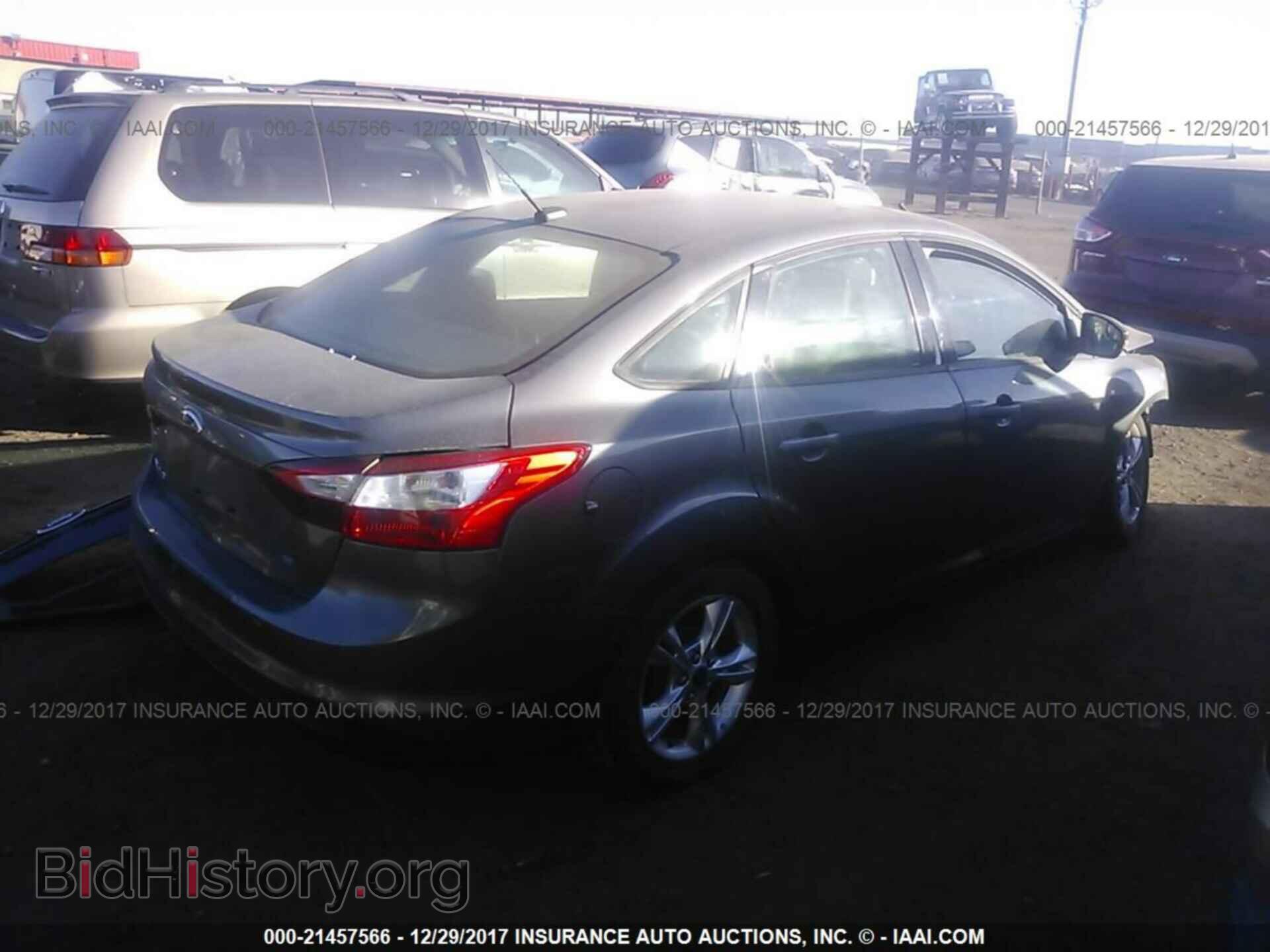 2014 Ford Focus - VIN: 1FADP3F28EL150487 - Photo 4
