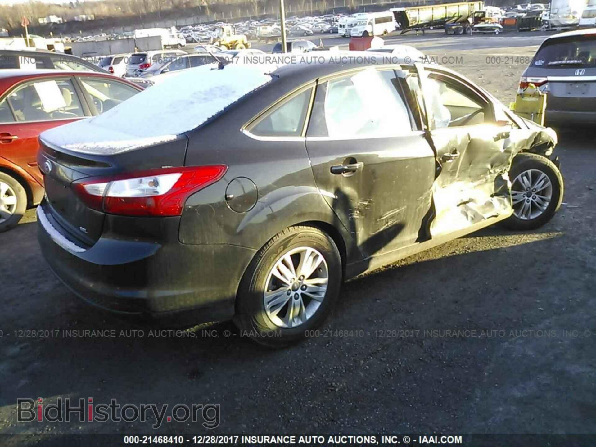2012 Ford Focus - VIN: 1FAHP3H24CL417099 - Photo 4