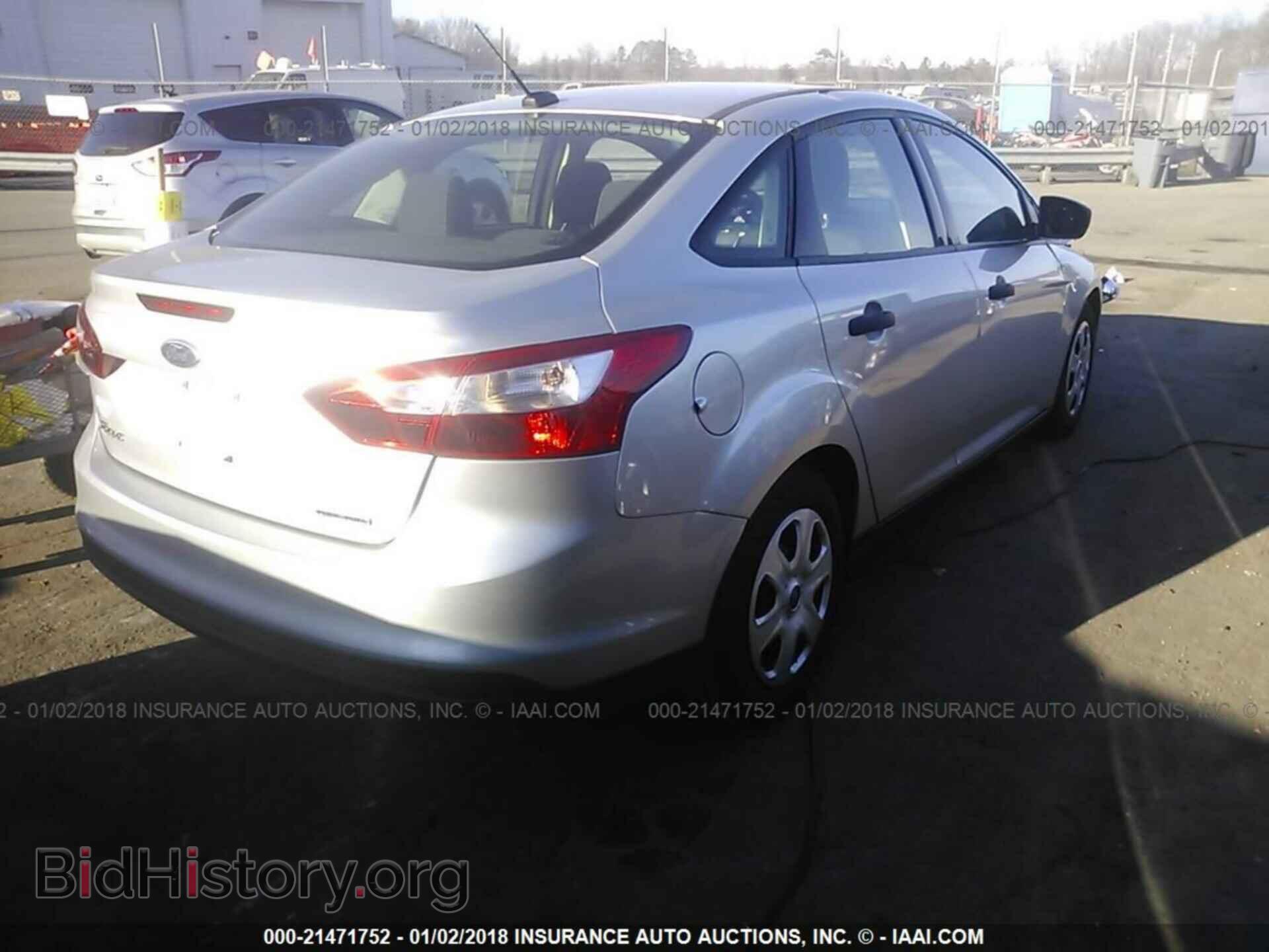 2014 Ford Focus - VIN: 1FADP3E20EL165499 - Фото 4