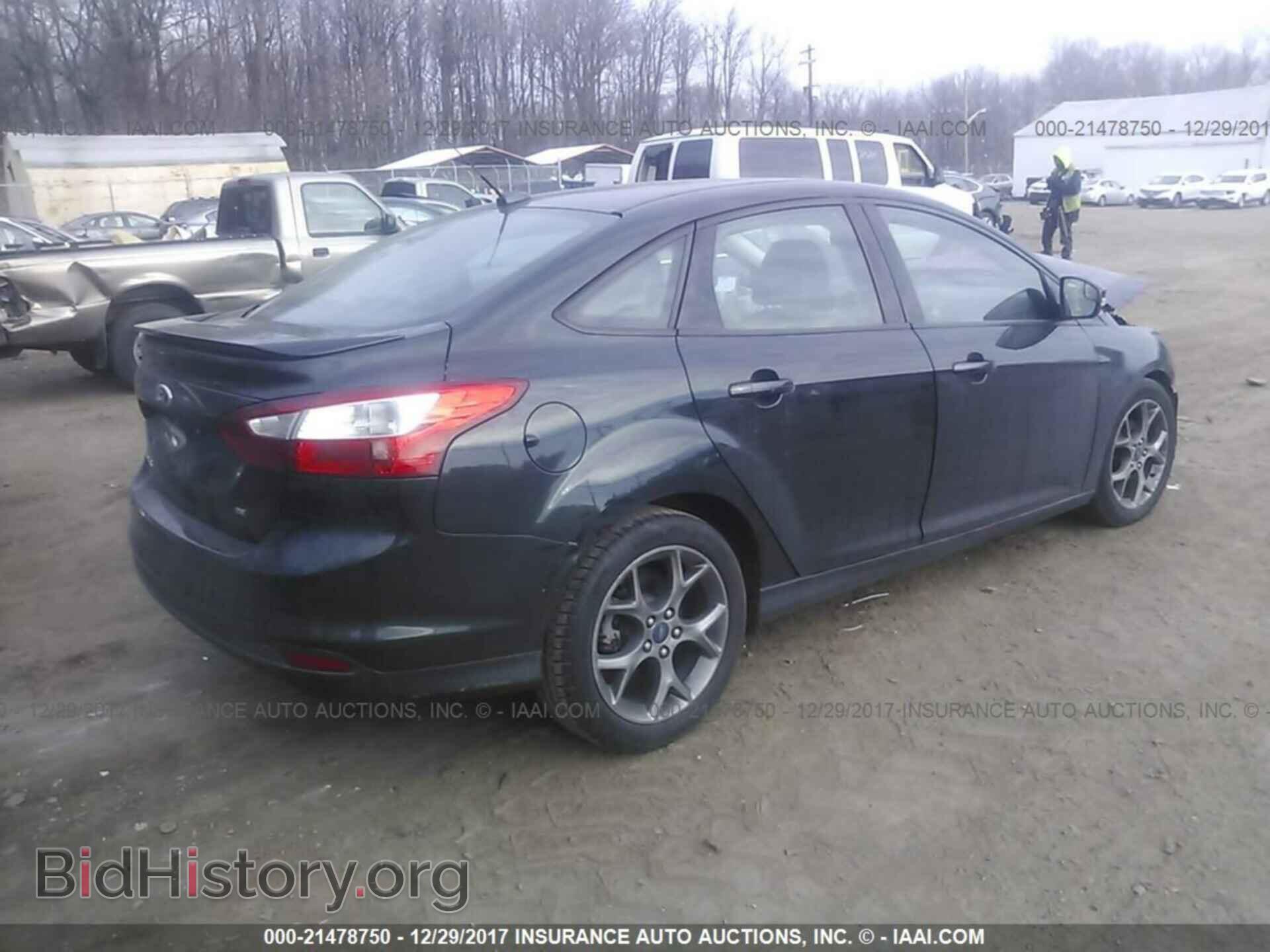 2014 Ford Focus - VIN: 1FADP3F22EL262282 - Photo 4