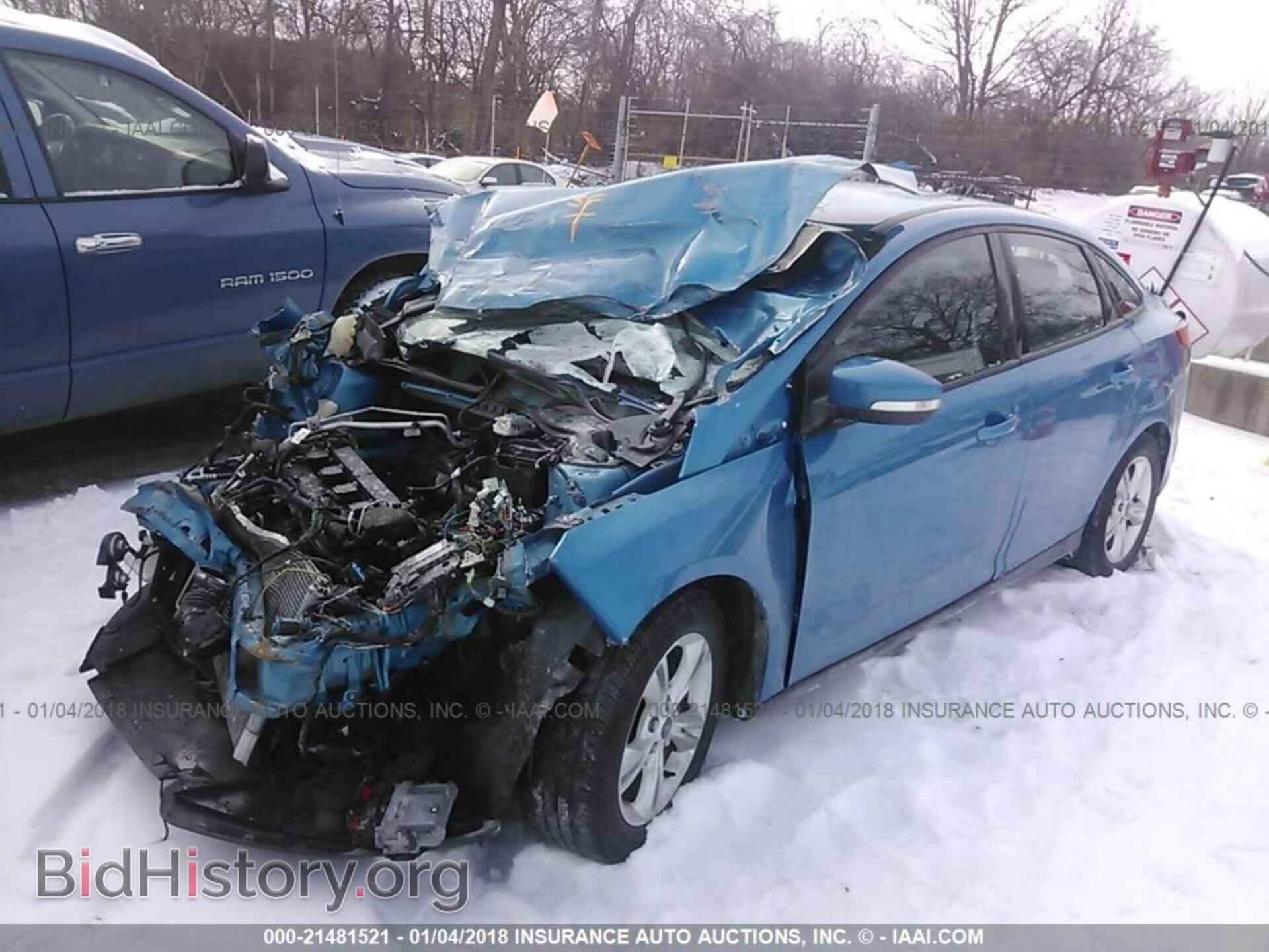 2014 Ford Focus - VIN: 1FADP3F21EL253136 - Фото 2