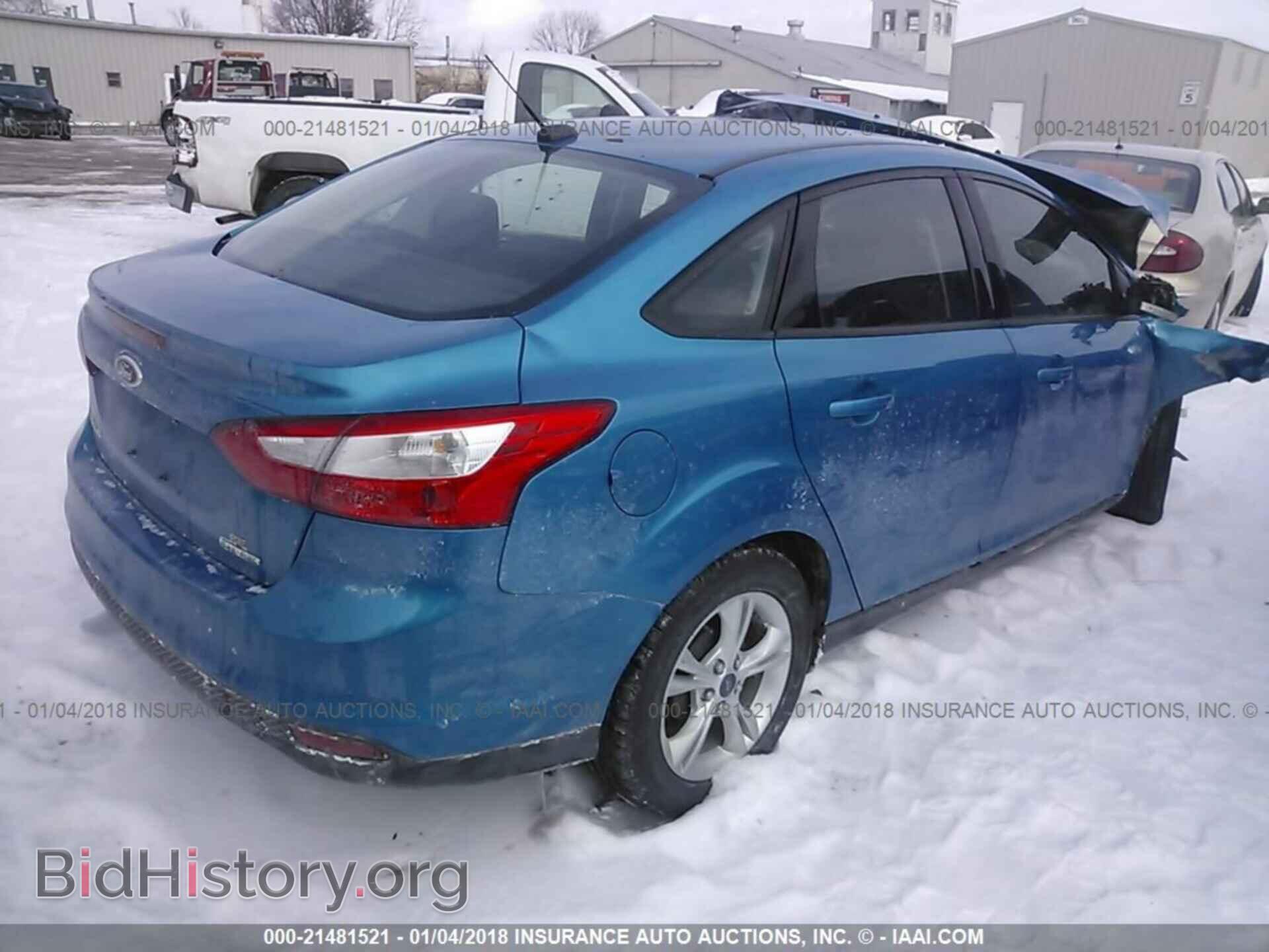 2014 Ford Focus - VIN: 1FADP3F21EL253136 - Фото 4
