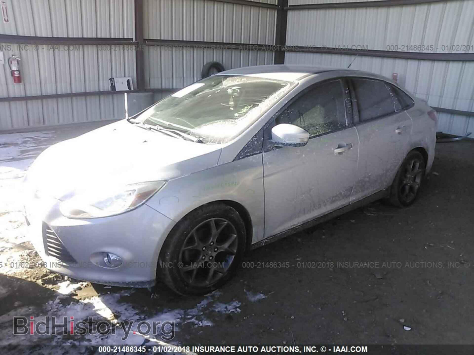 2013 Ford Focus - VIN: 1FADP3F24DL320309 - Photo 2