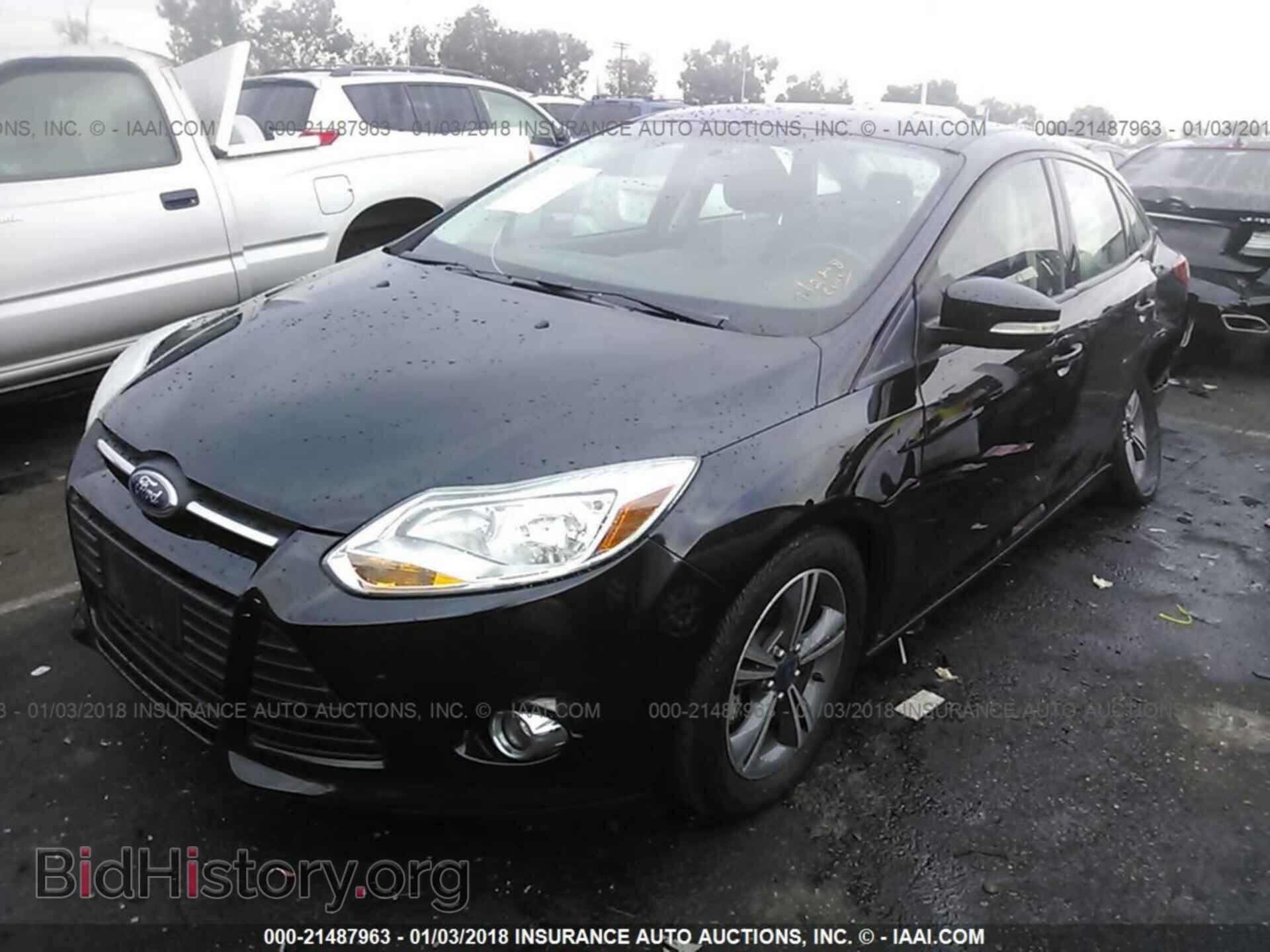 2014 Ford Focus - VIN: 1FADP3F22EL138917 - Фото 2