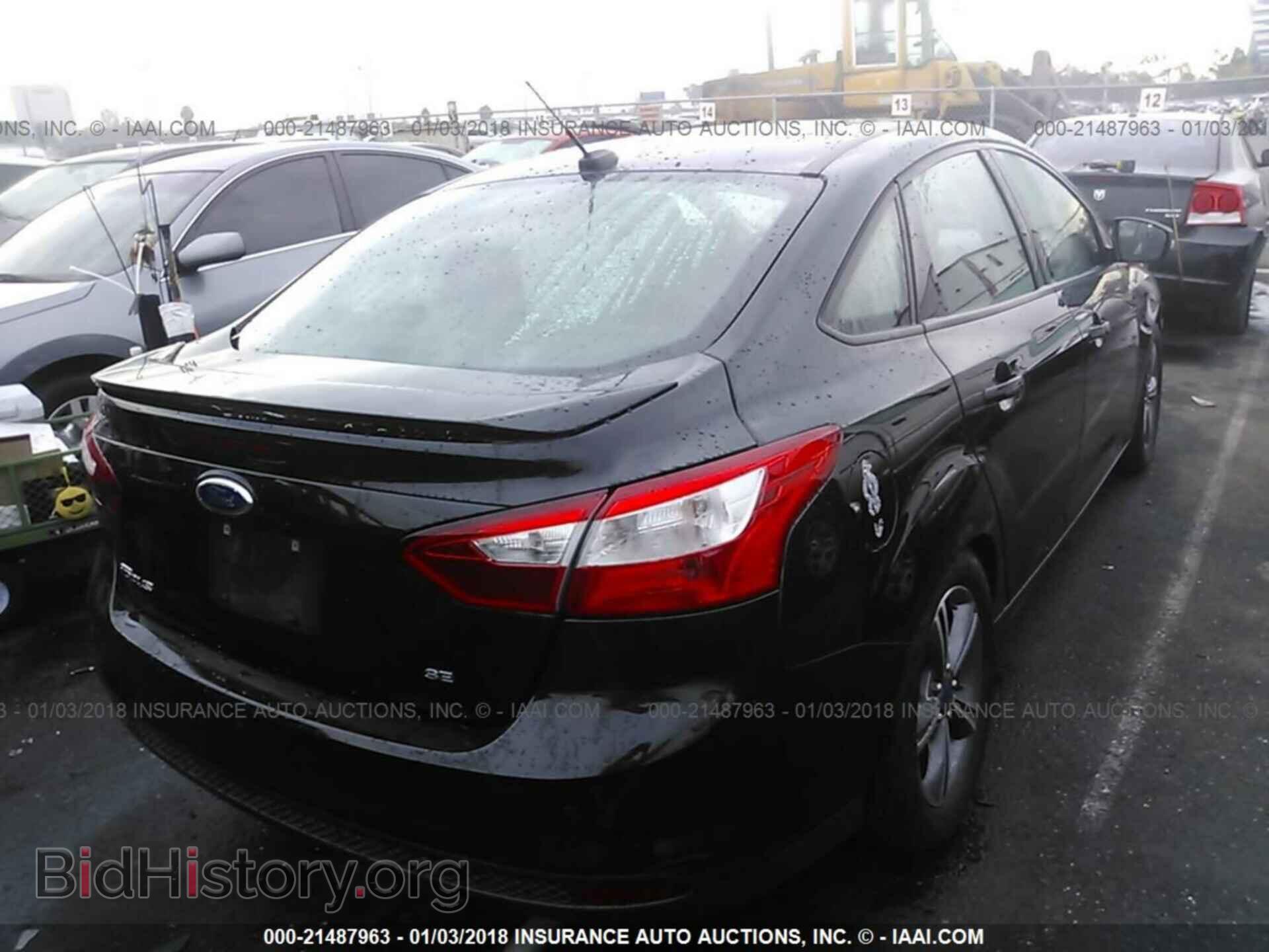 2014 Ford Focus - VIN: 1FADP3F22EL138917 - Фото 4