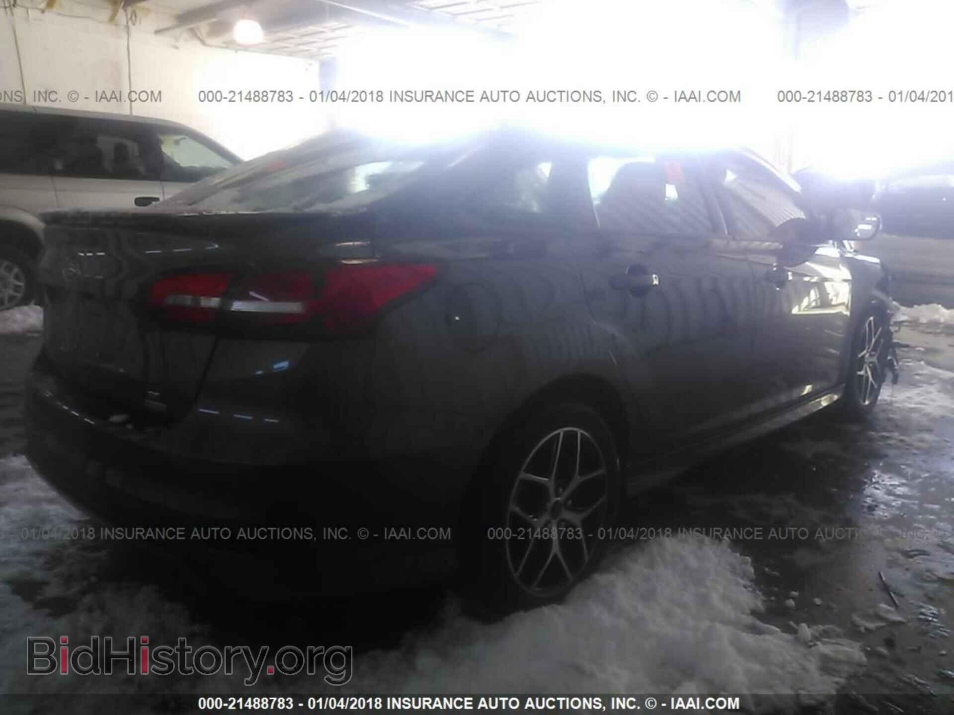2015 Ford Focus - VIN: 1FADP3FE4FL207988 - Photo 4