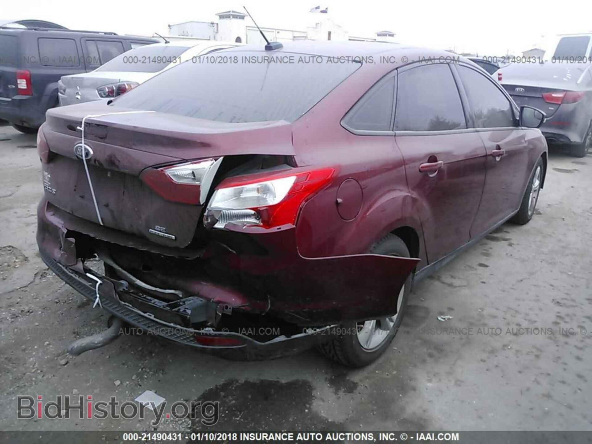 2014 Ford Focus - VIN: 1FADP3F22EL236331 - Photo 4