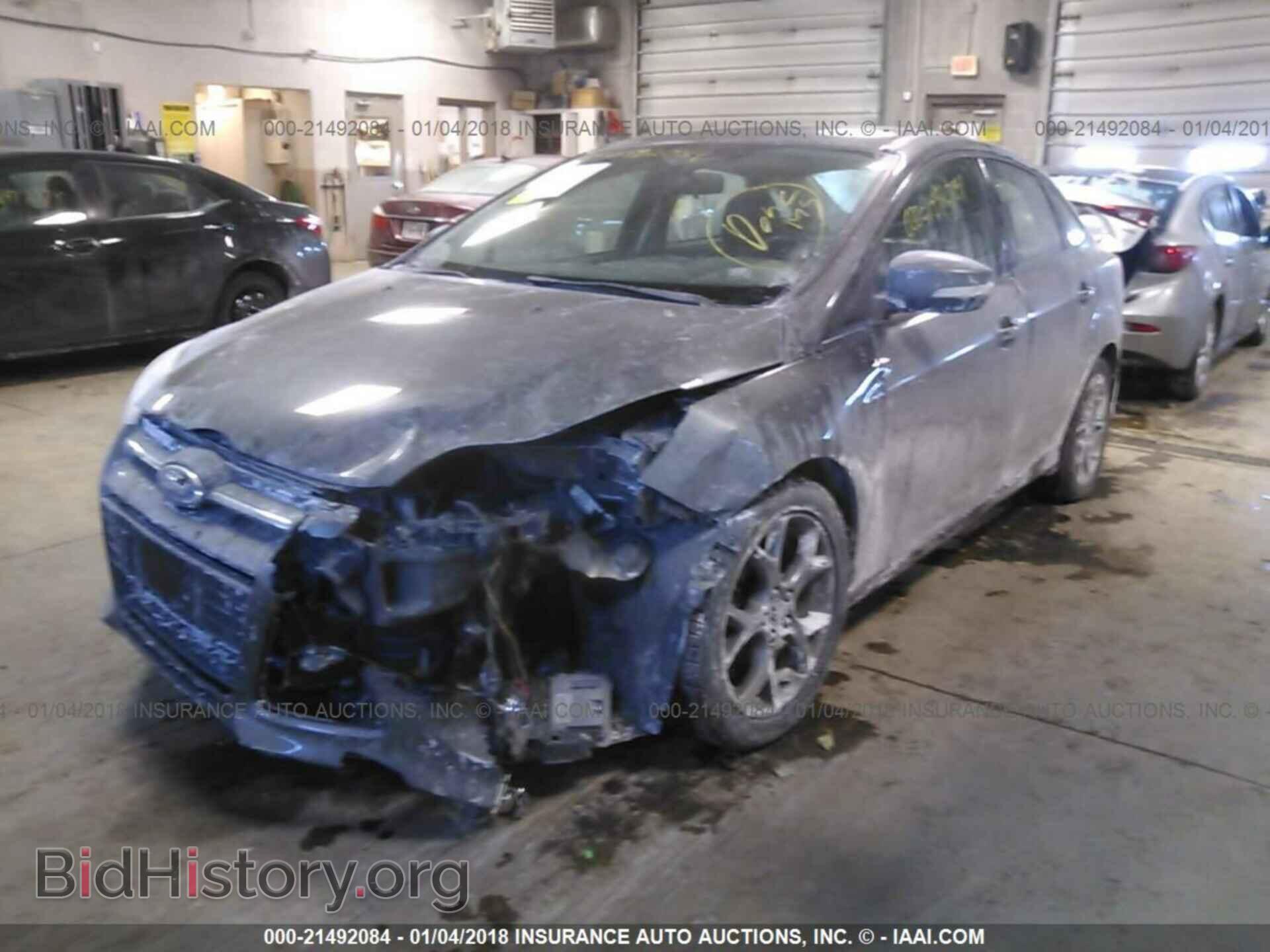 2013 Ford Focus - VIN: 1FADP3F21DL194281 - Фото 2