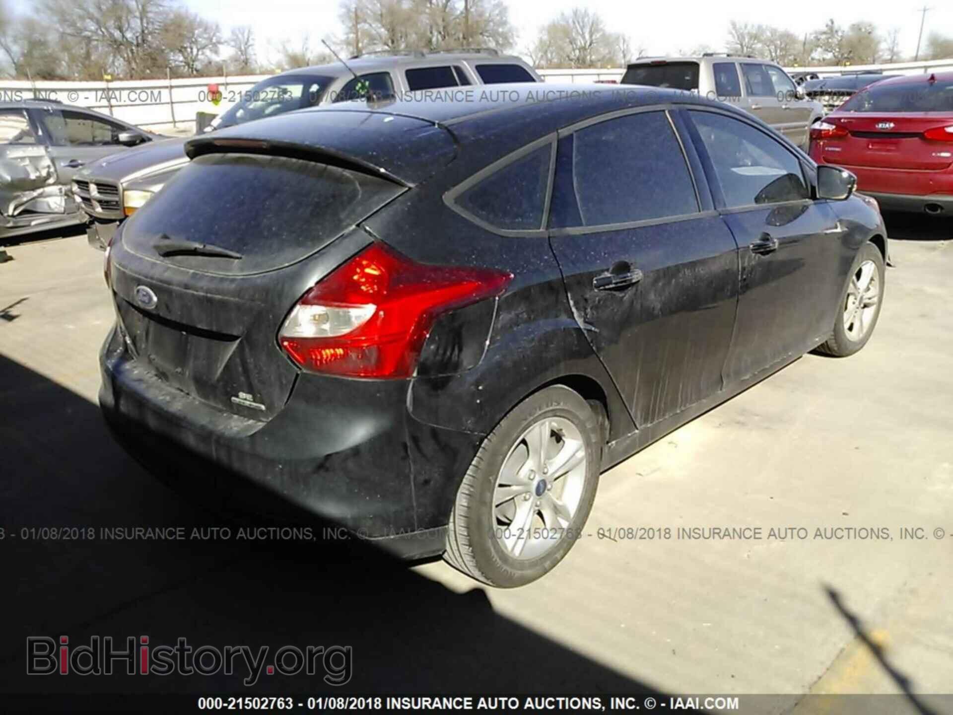 2013 Ford Focus - VIN: 1FADP3K22DL372379 - Photo 4