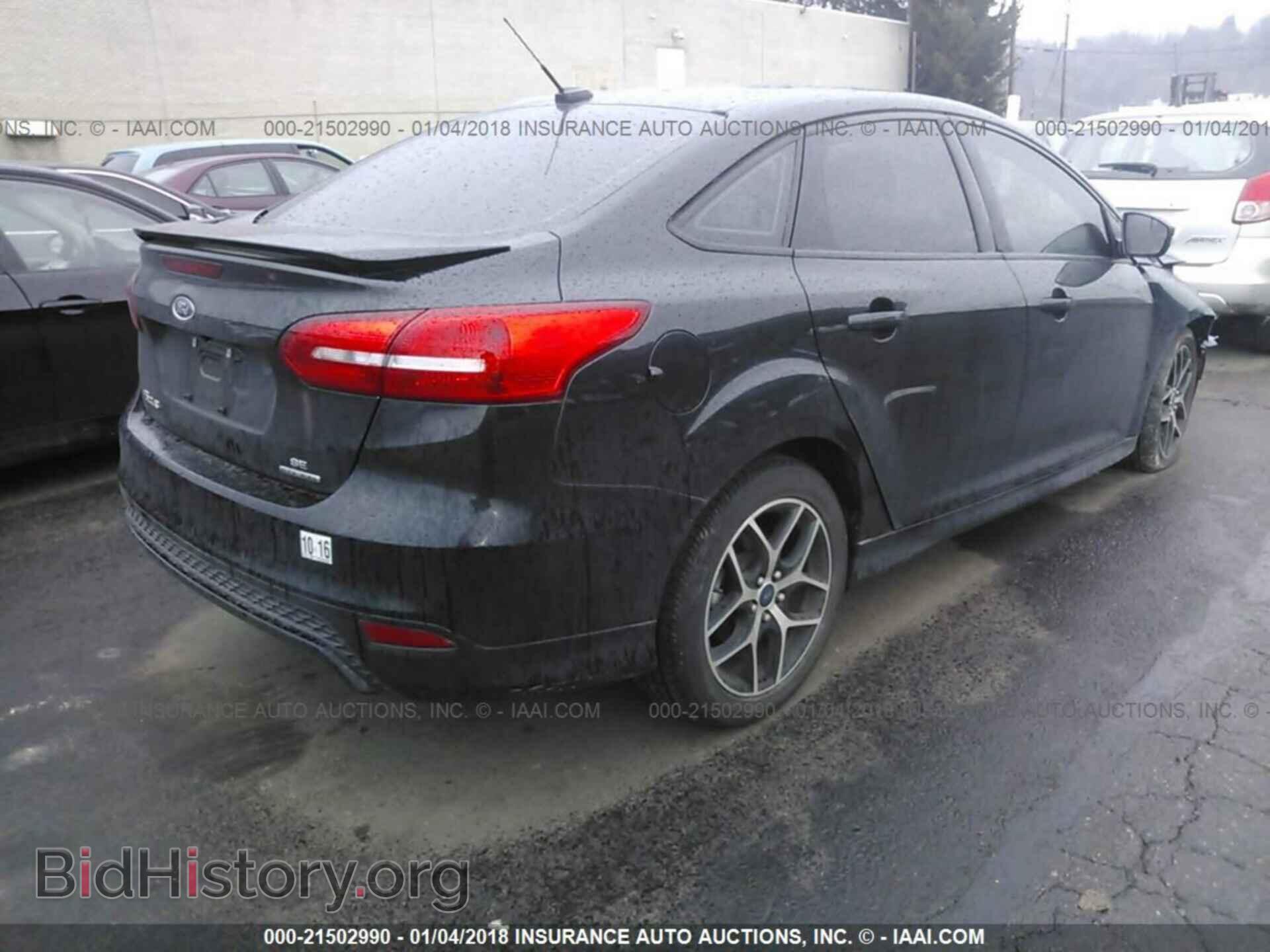 2015 Ford Focus - VIN: 1FADP3F28FL269237 - Photo 4