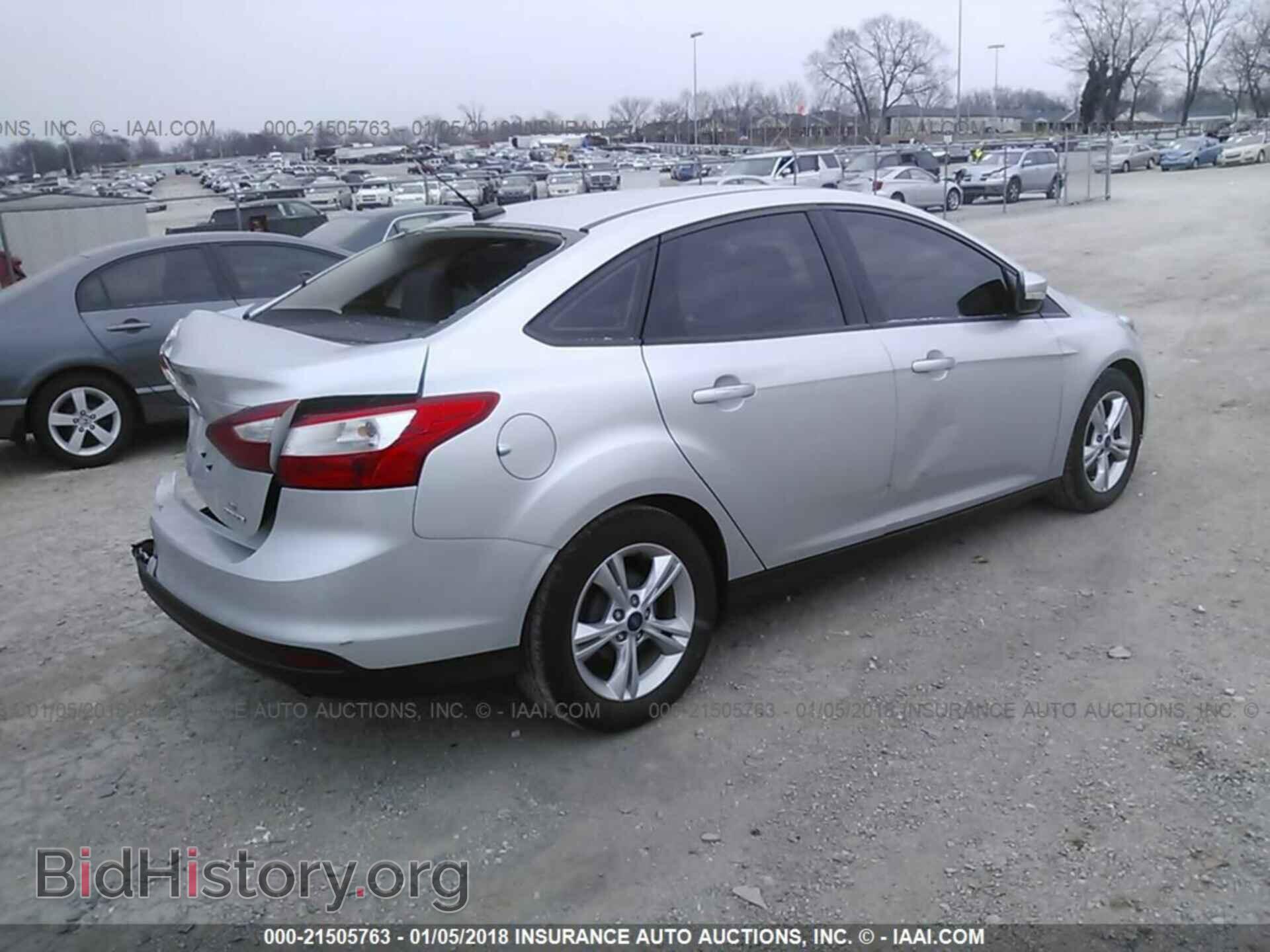 2014 Ford Focus - VIN: 1FADP3F29EL135190 - Фото 4