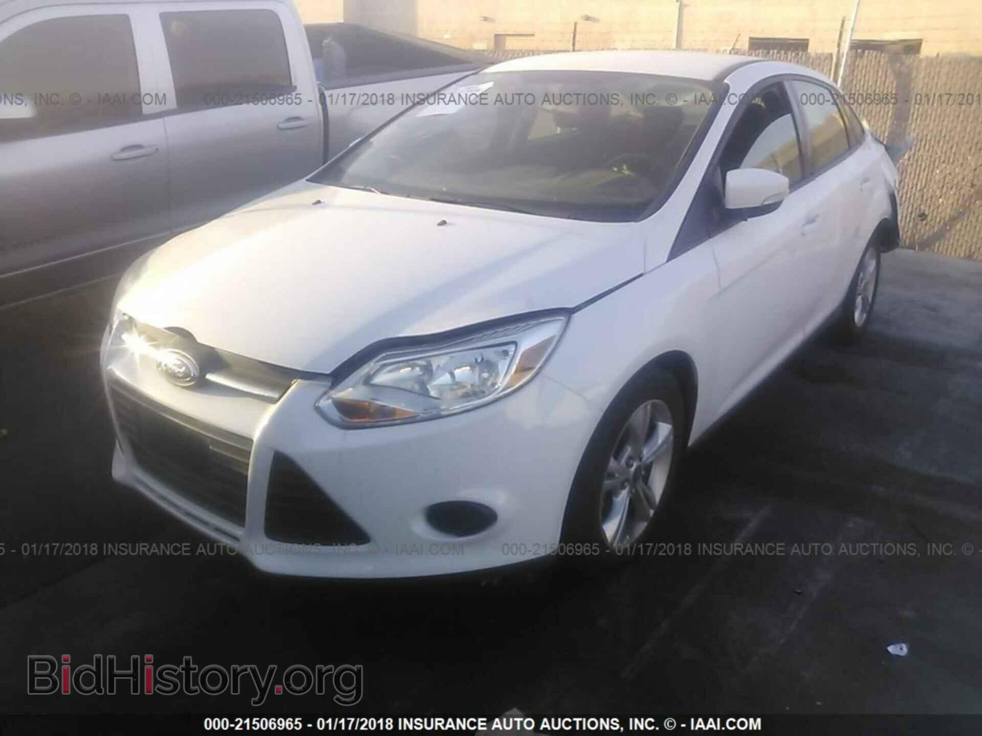 2013 Ford Focus - VIN: 1FADP3F24DL213115 - Photo 2