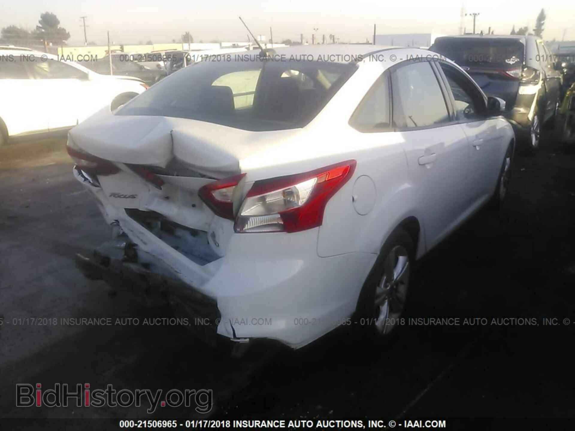 2013 Ford Focus - VIN: 1FADP3F24DL213115 - Photo 4