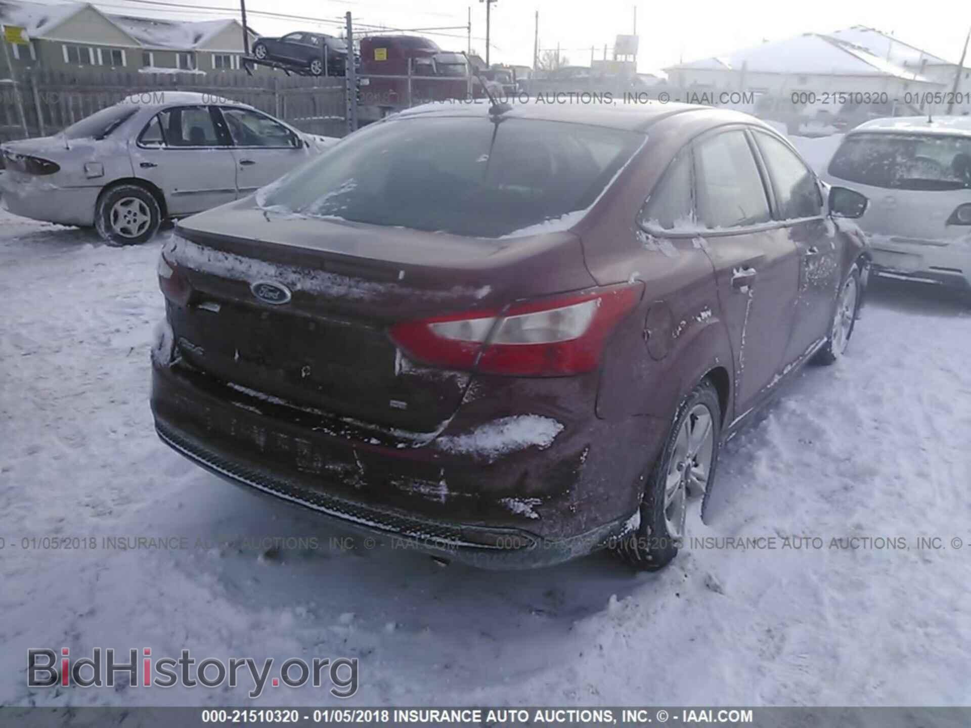 2014 Ford Focus - VIN: 1FADP3F23EL404669 - Photo 4