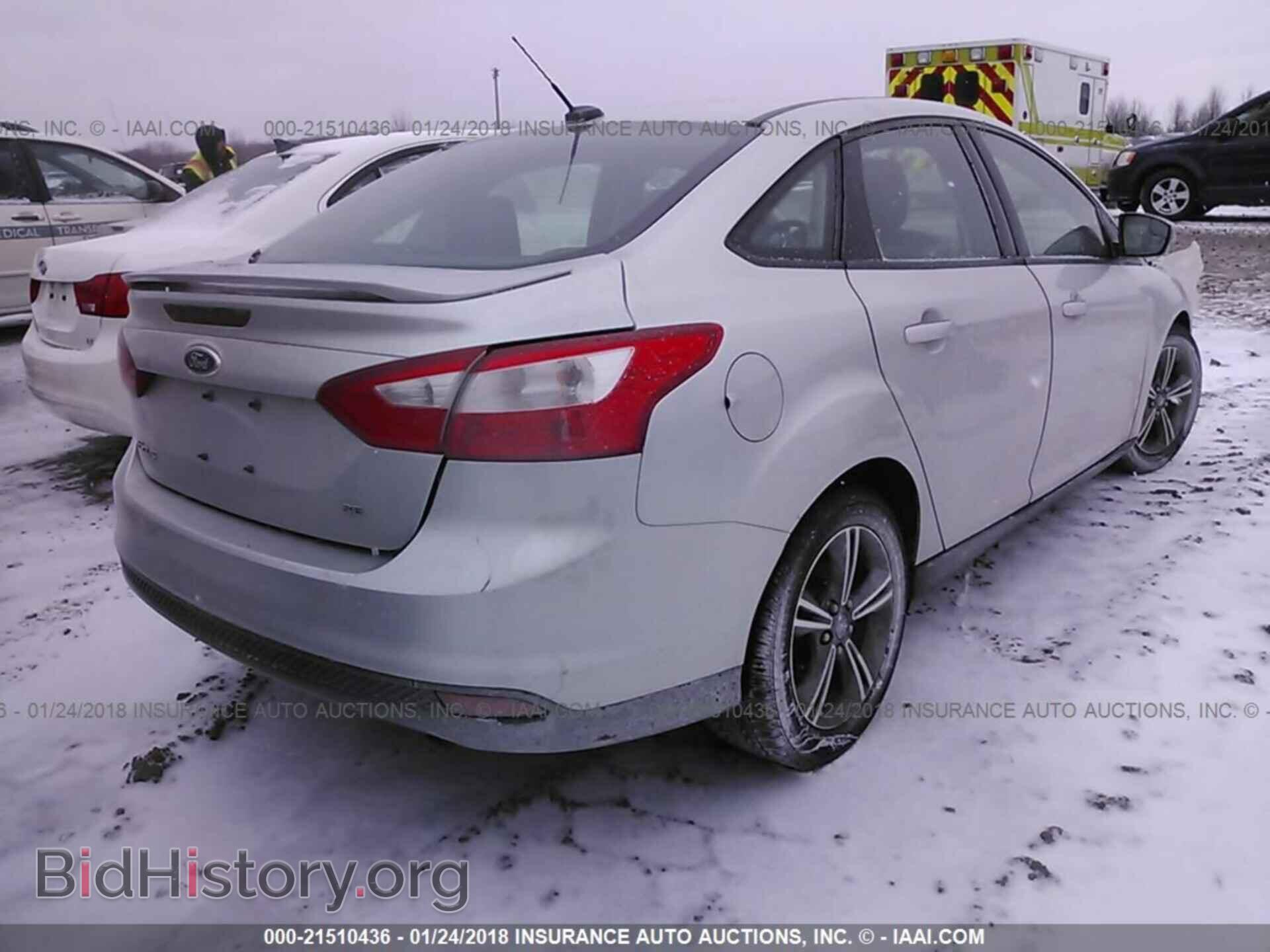 2014 Ford Focus - VIN: 1FADP3F24EL121097 - Фото 4