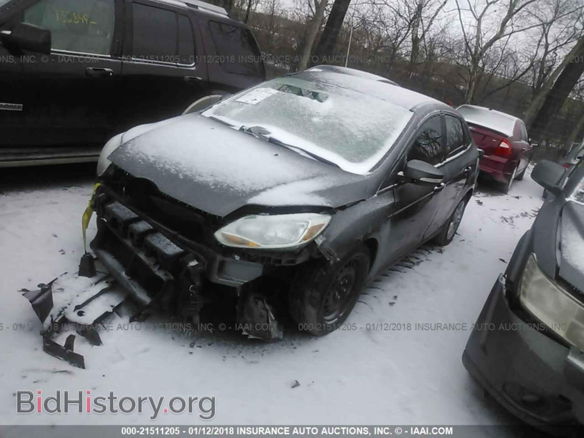 2013 Ford Focus - VIN: 1FADP3F22DL317778 - Photo 2
