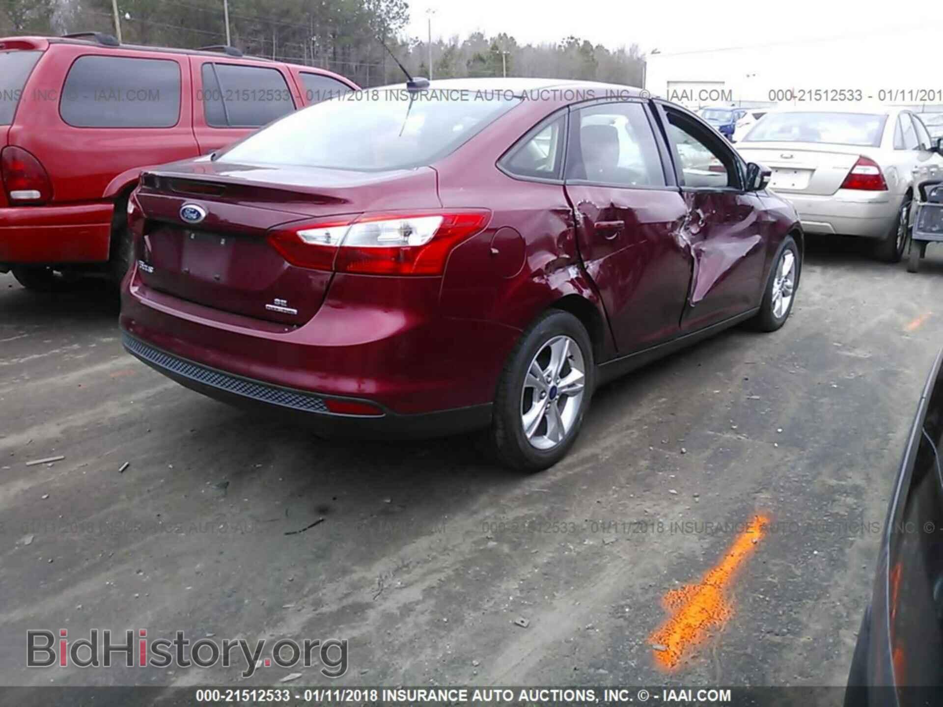 2013 Ford Focus - VIN: 1FADP3F24DL343542 - Photo 4