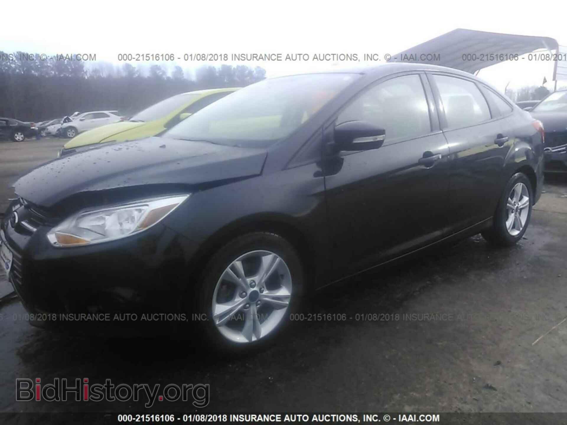 2014 Ford Focus - VIN: 1FADP3F26EL457639 - Фото 2